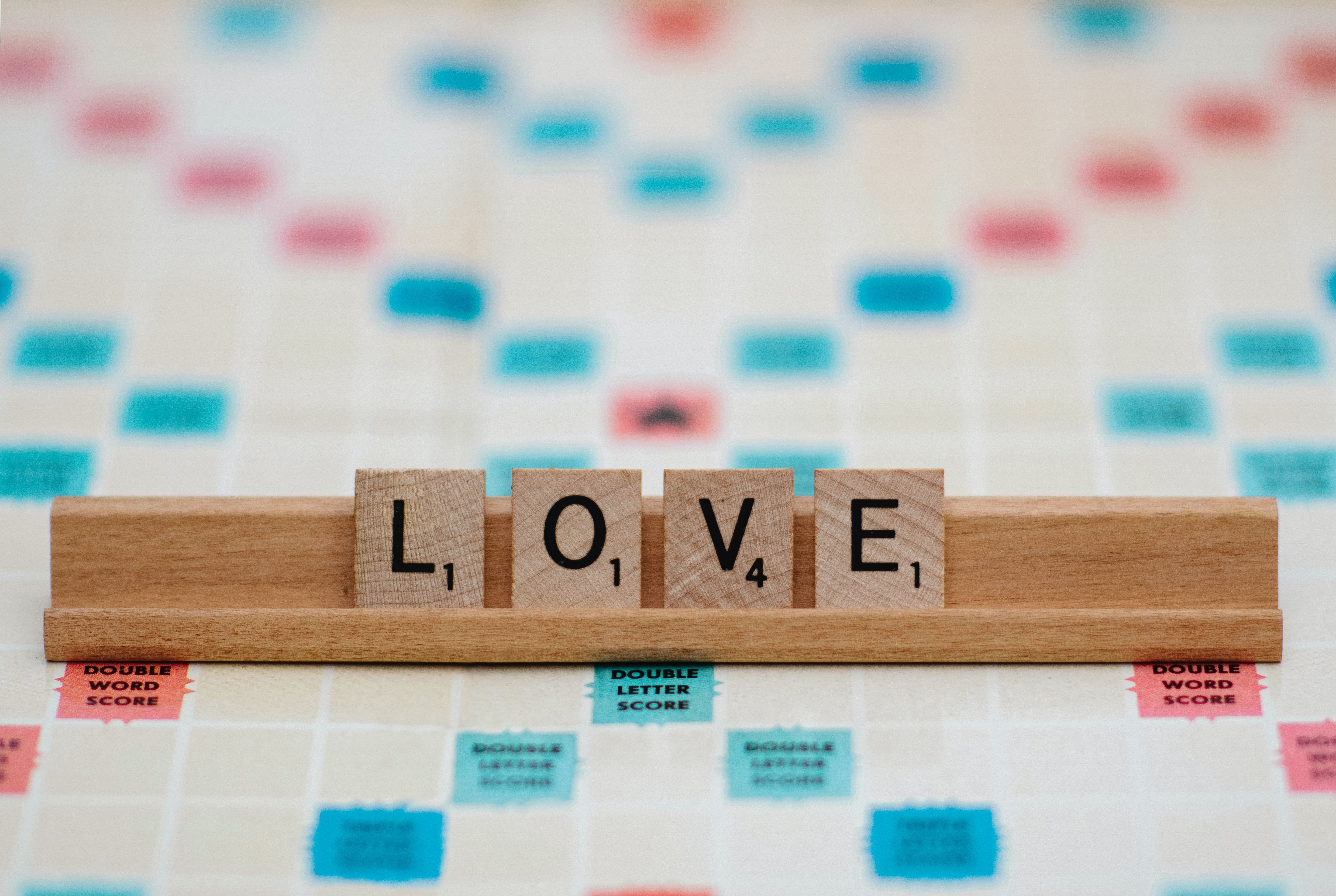 Scrabble tiles that spell out love