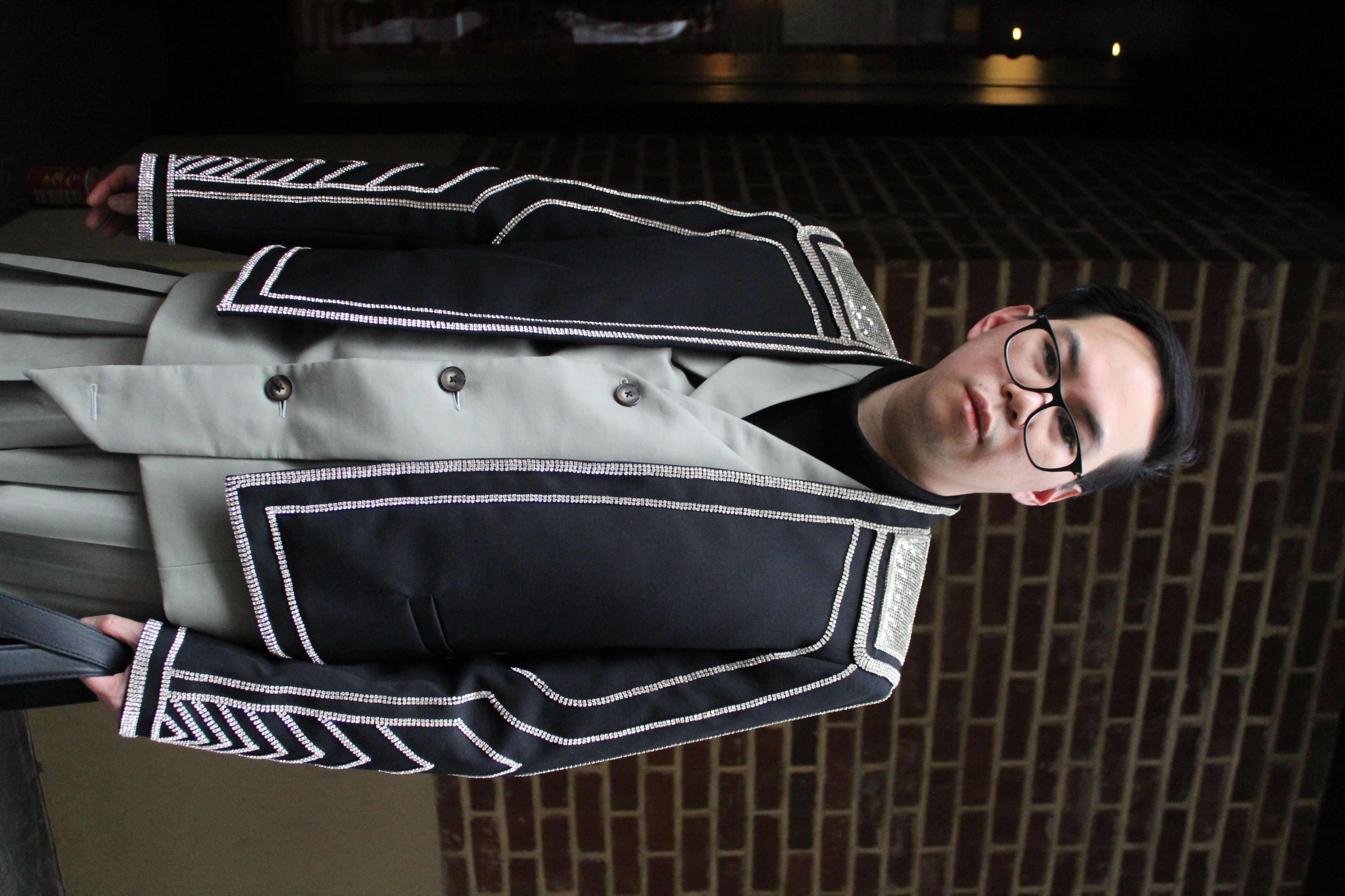 Man in green outfit at NYFW