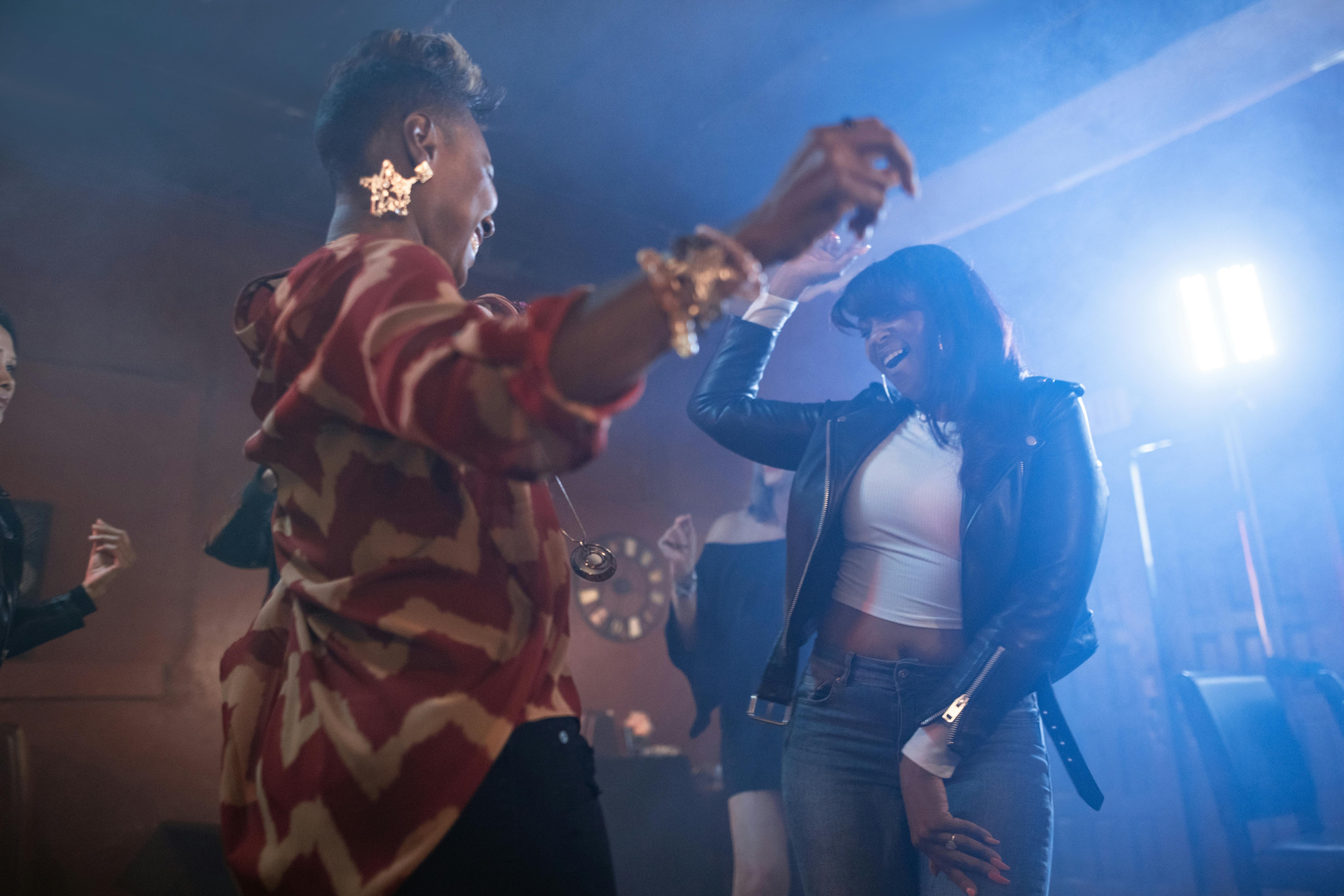 women dancing at a bar?width=1024&height=1024&fit=cover&auto=webp&dpr=4