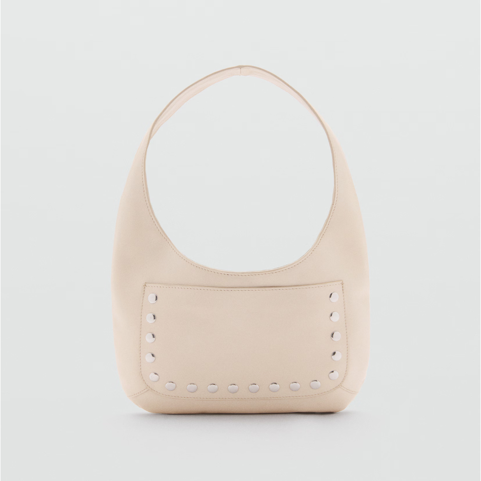 A tan bag on a white background