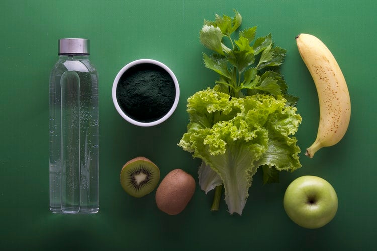 Flatlay of food on green background