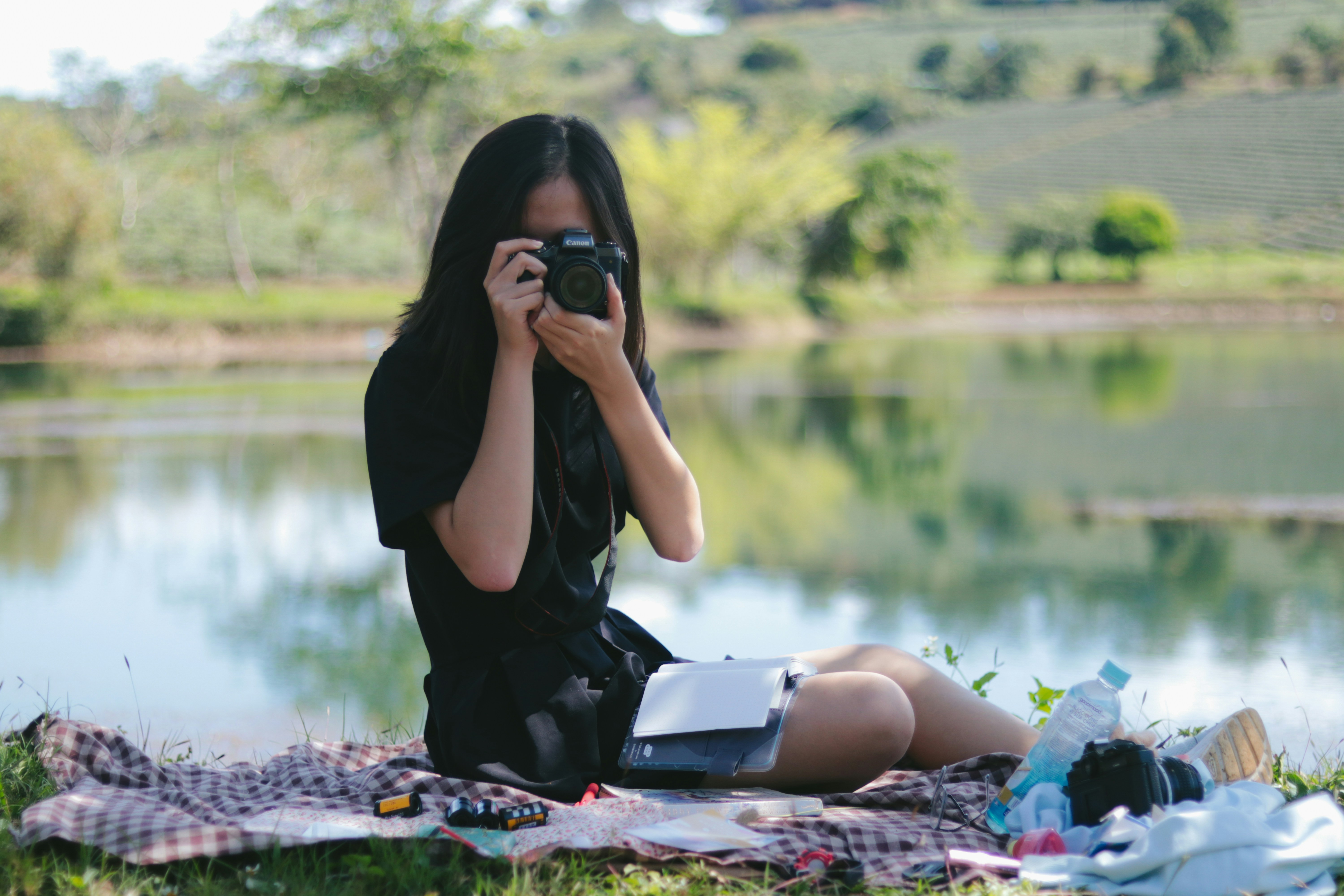 girl taking a photograph
