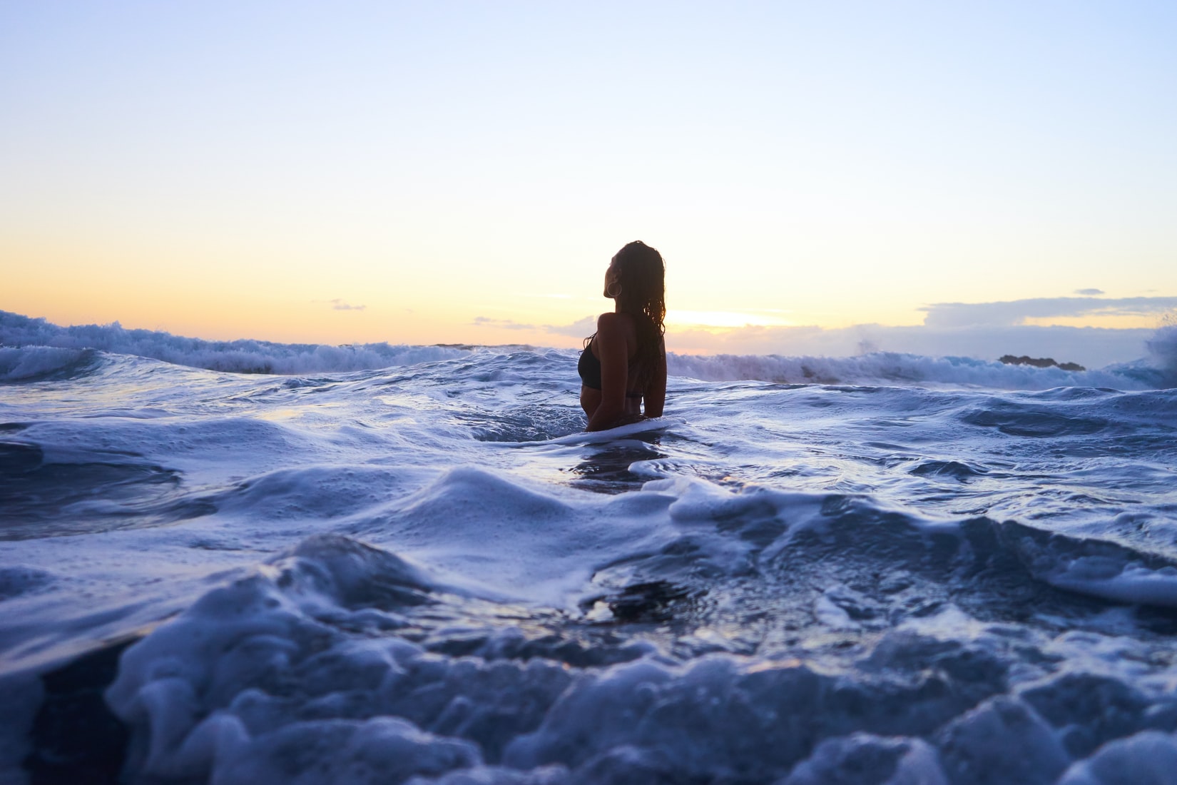 Woman in the ocean by Yoann Boyer via Unsplash?width=698&height=466&fit=crop&auto=webp&dpr=4