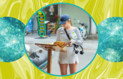 traveling woman in city looking at restaurant menu