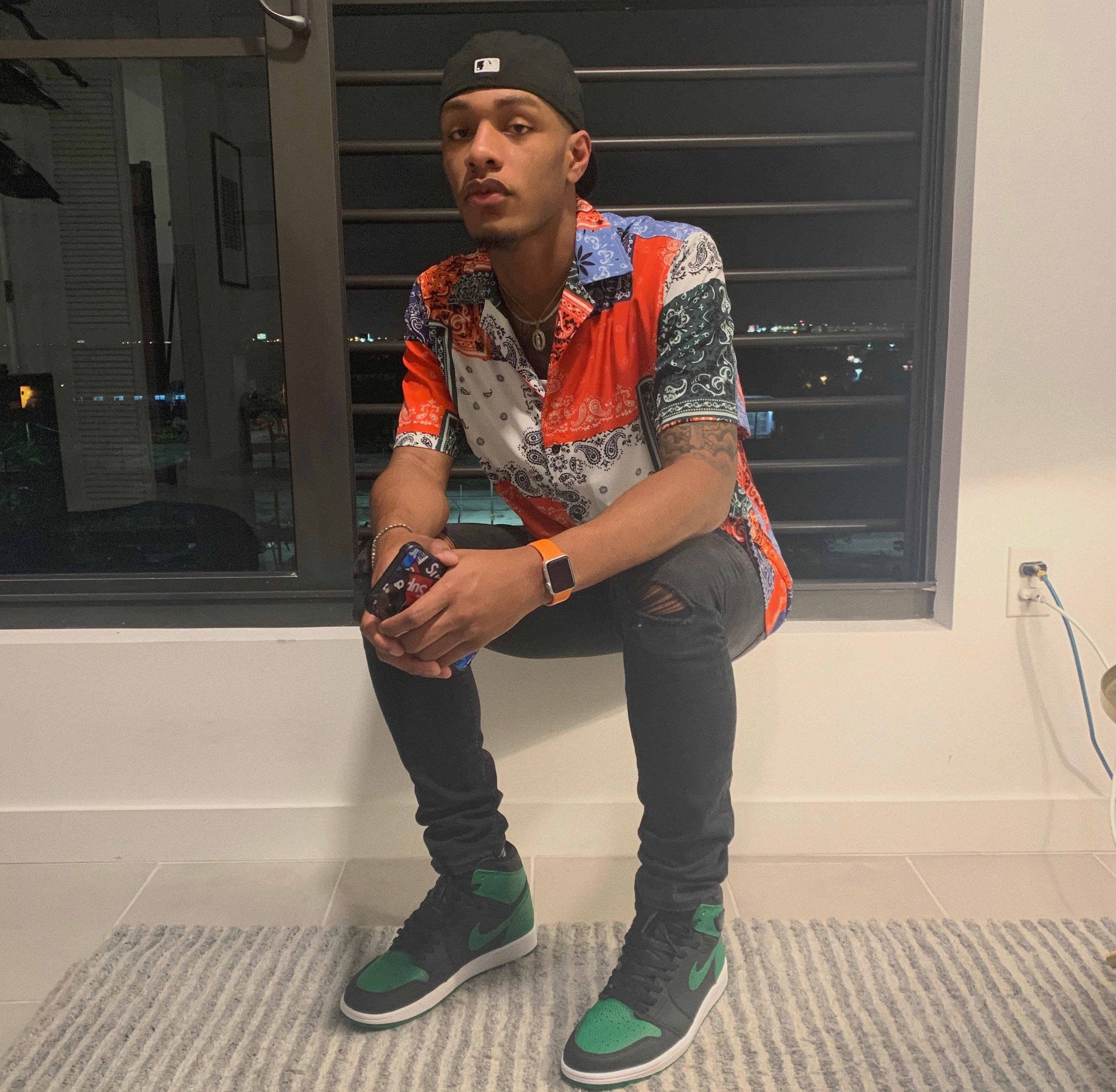 man sitting by Moya Leung?width=698&height=466&fit=crop&auto=webp&dpr=4