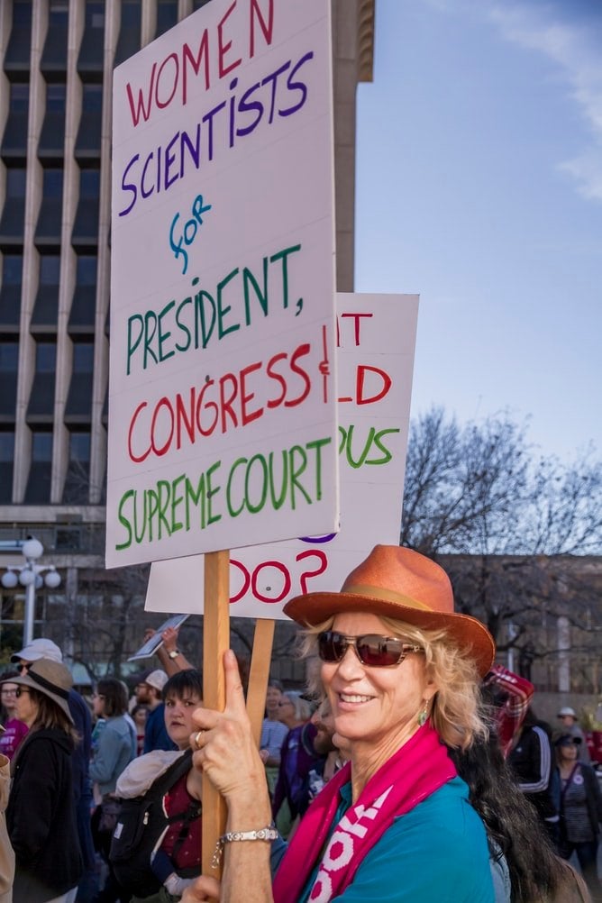 Sign calling for more women in public office