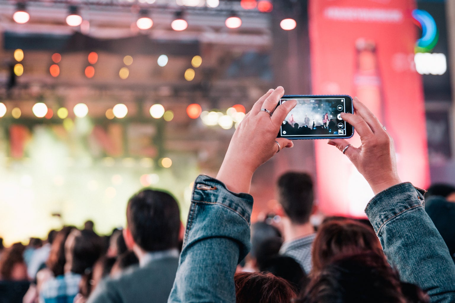 woman taking a picture on a show and festival
