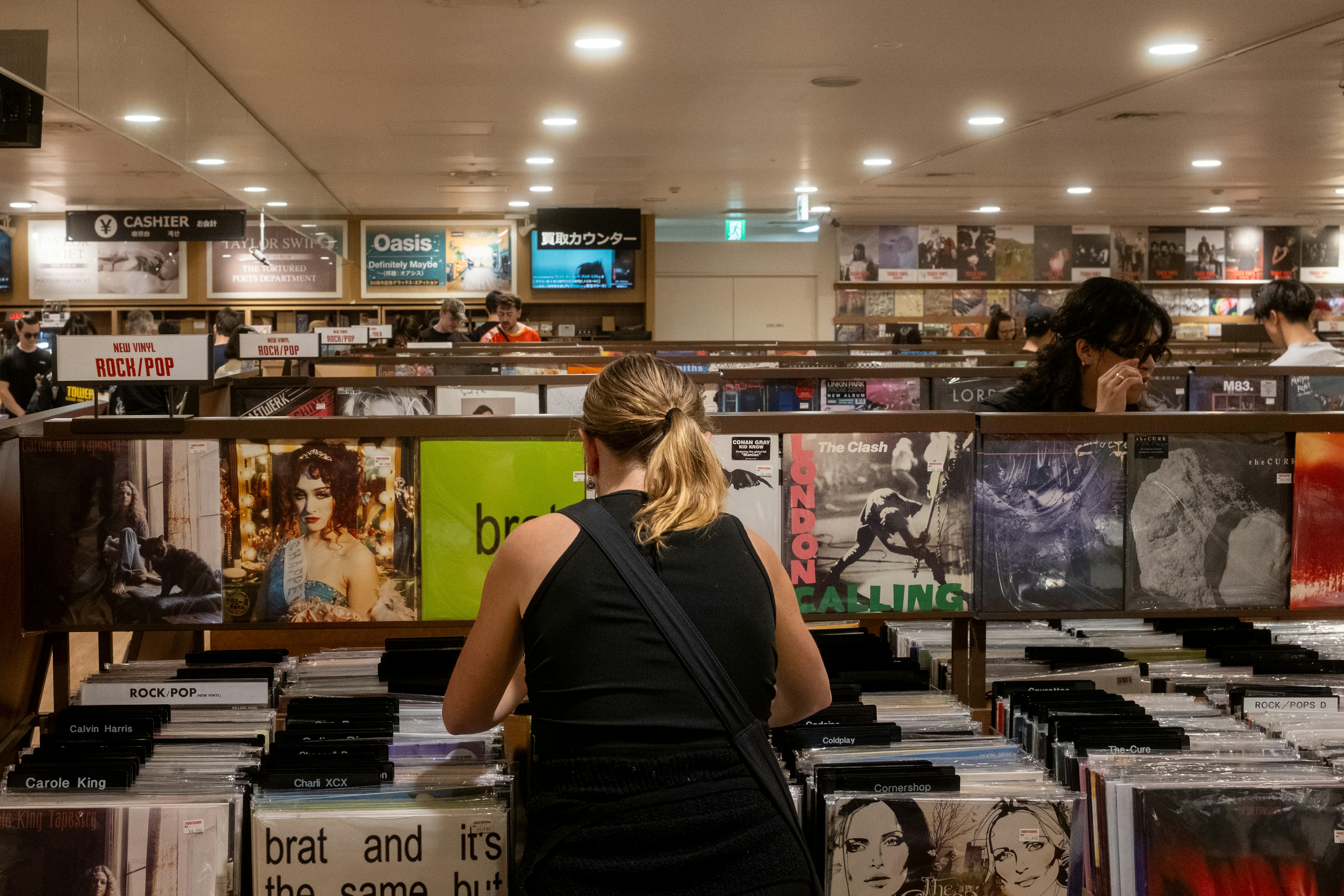 Woman looking through Vinyl records