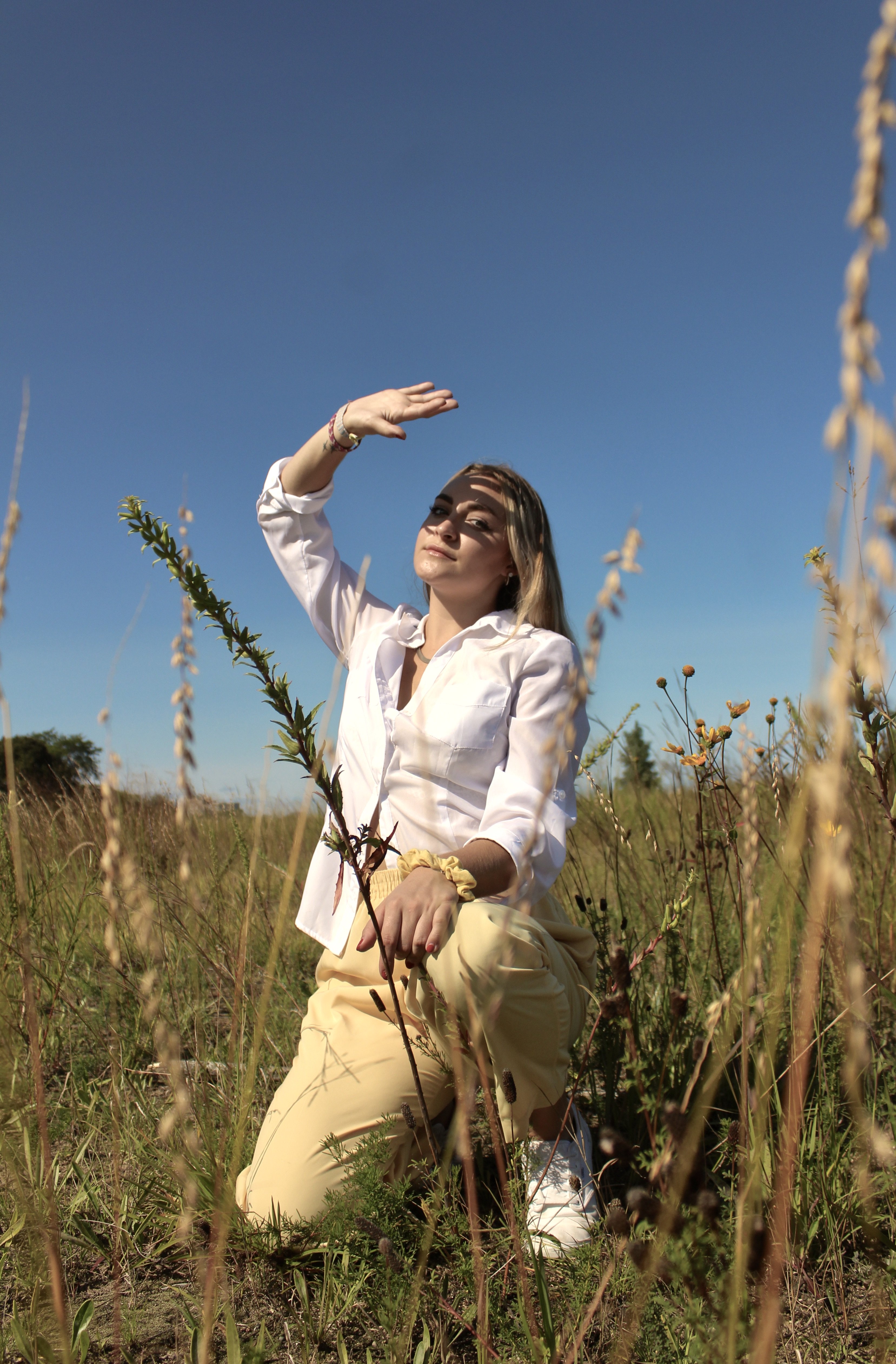 Girl in wildflower field
