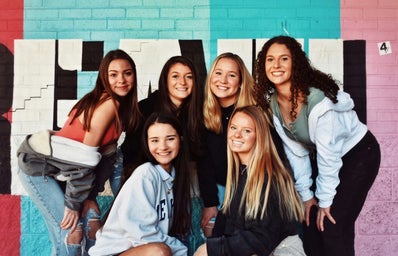 A group of girls representing the sisterhood of a sorority.