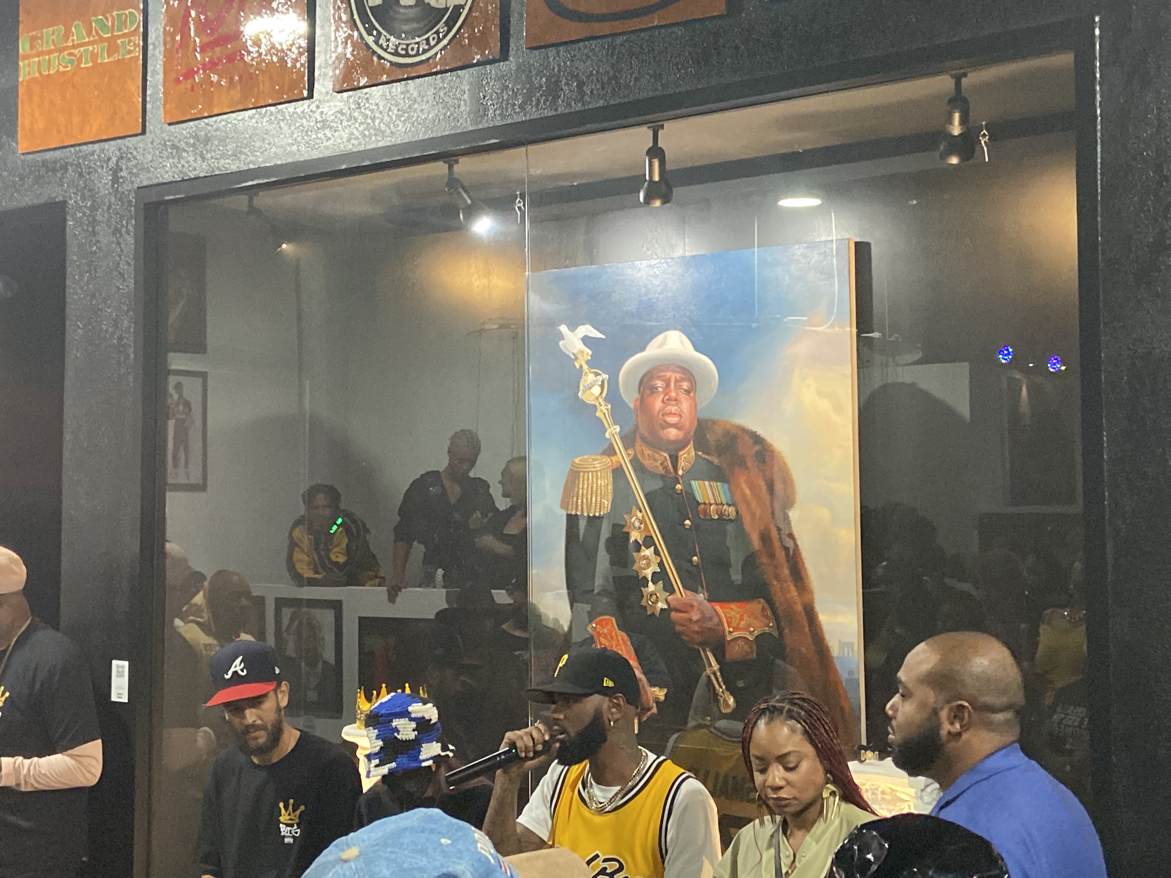 Artists discussing art pieces and curation.