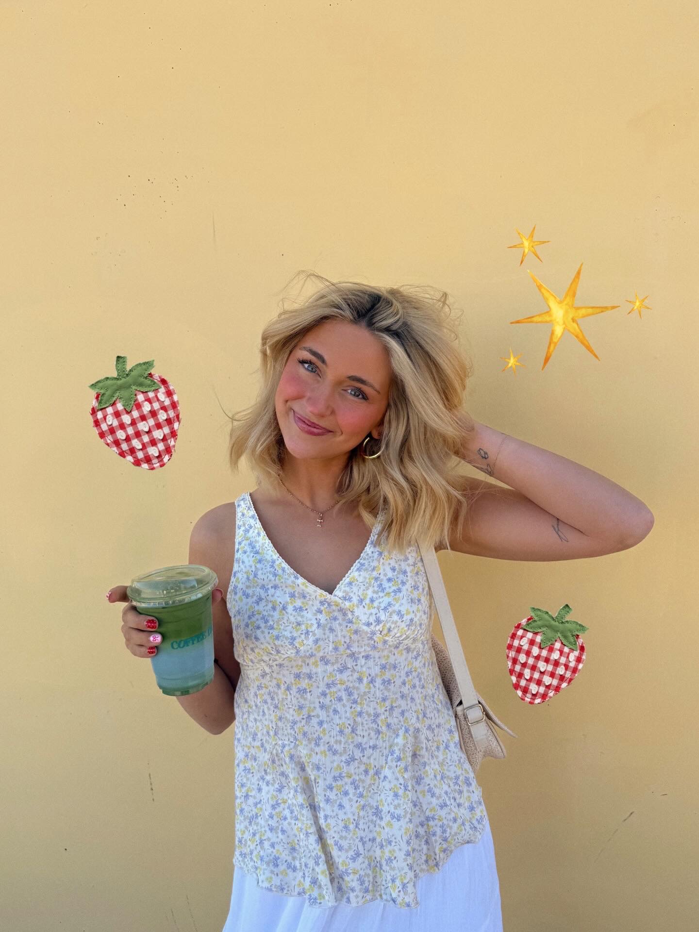 Claira Young smiling for a picture with matcha.