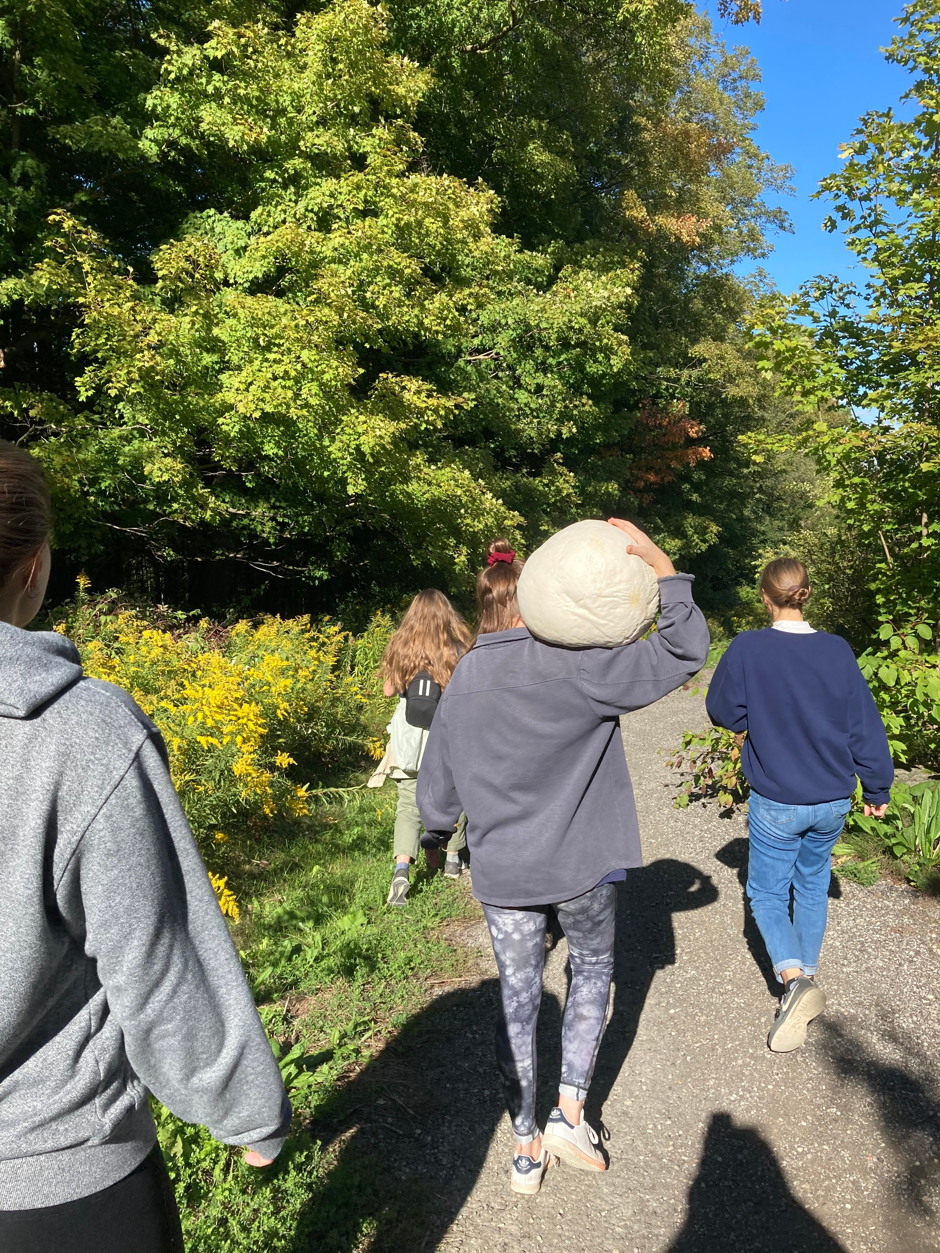 Girls hiking on a trail