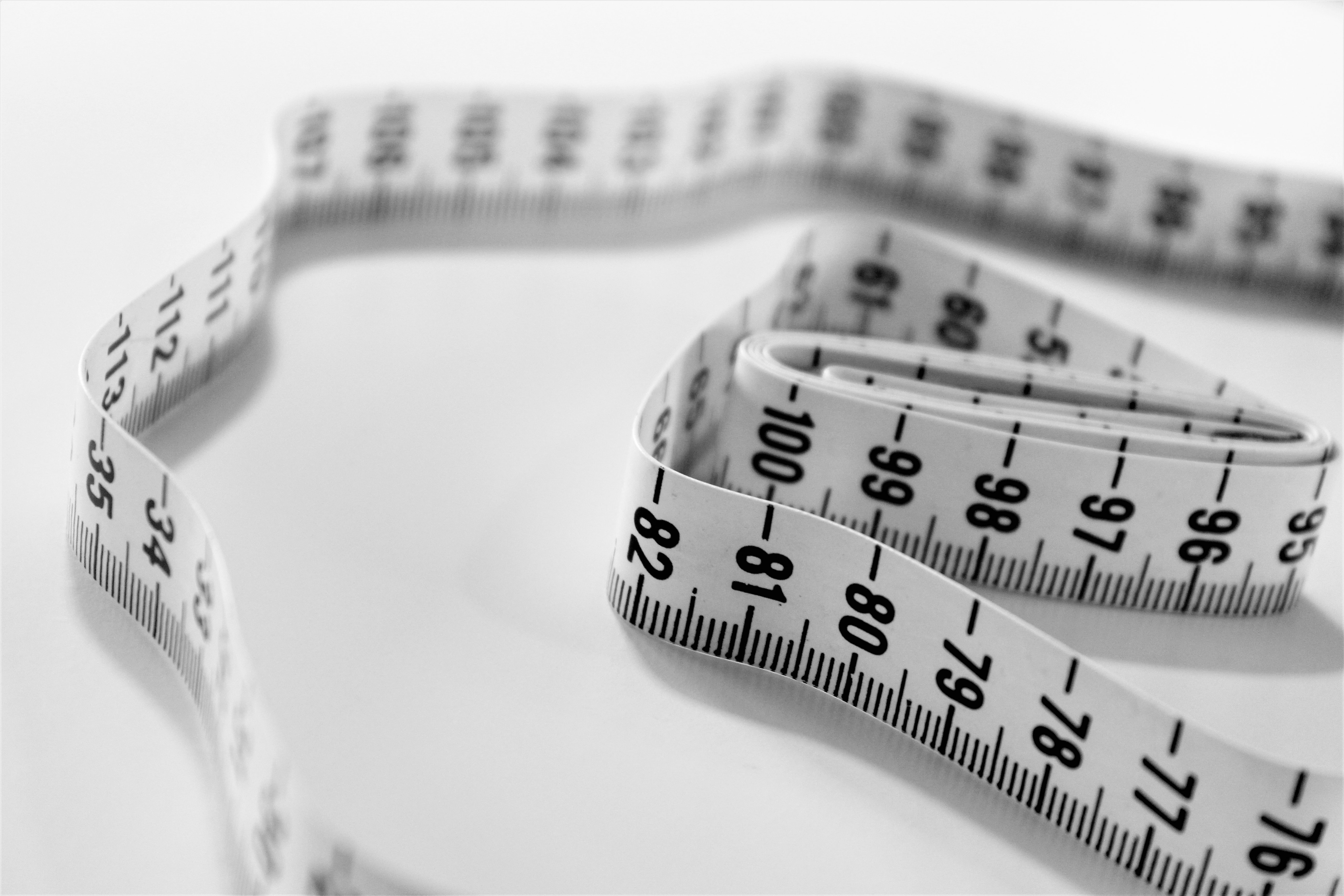 close up of white measuring tape