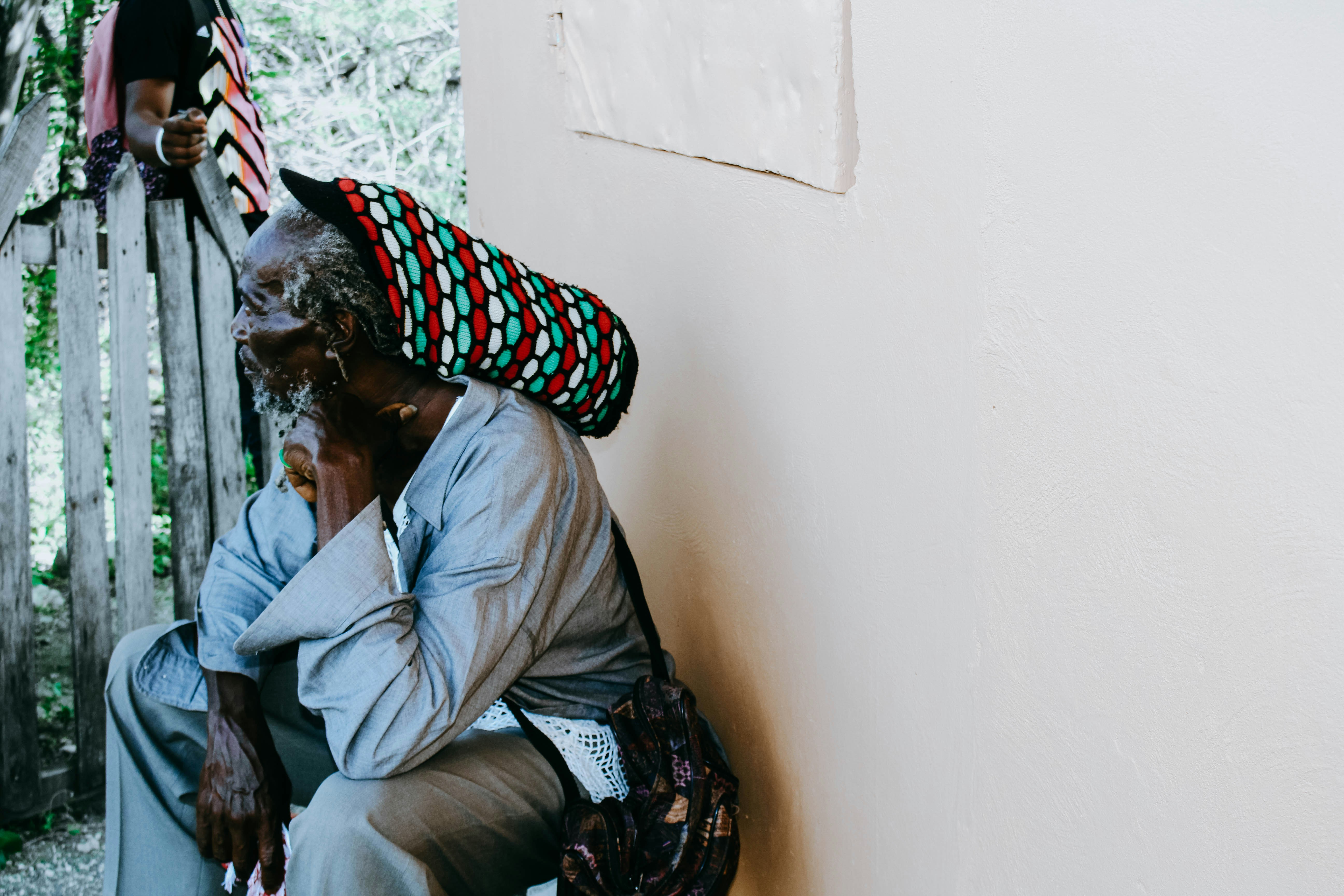 man sitting on stool