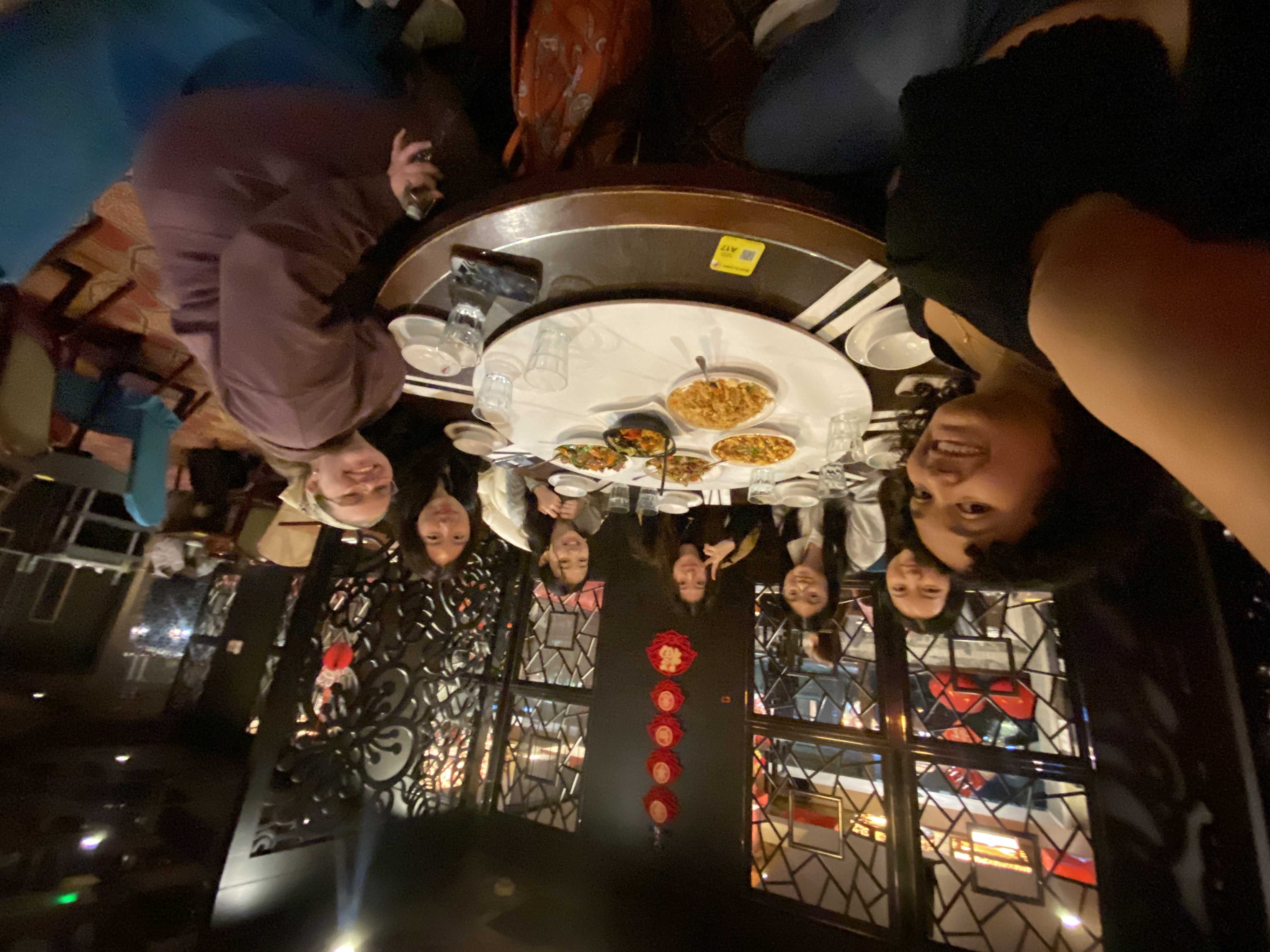 Photo of friends sitting at a restaurant