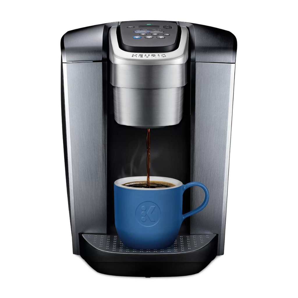 silver and black single-cup coffee maker filling up blue mug