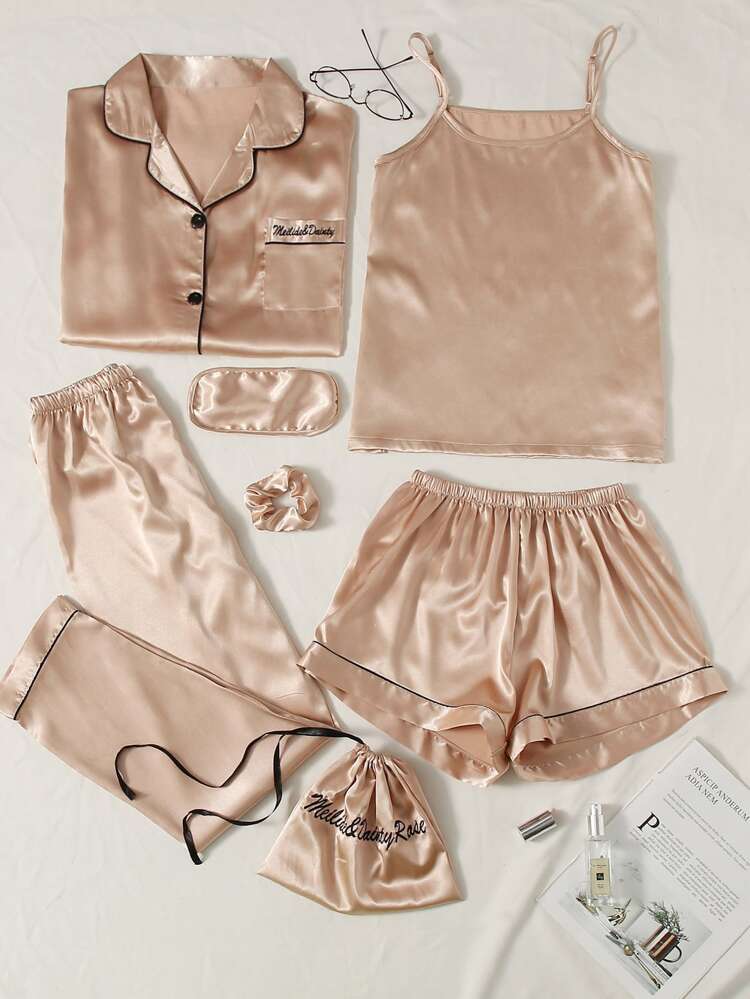 Light pink and black satin pajama set. Short and long style.