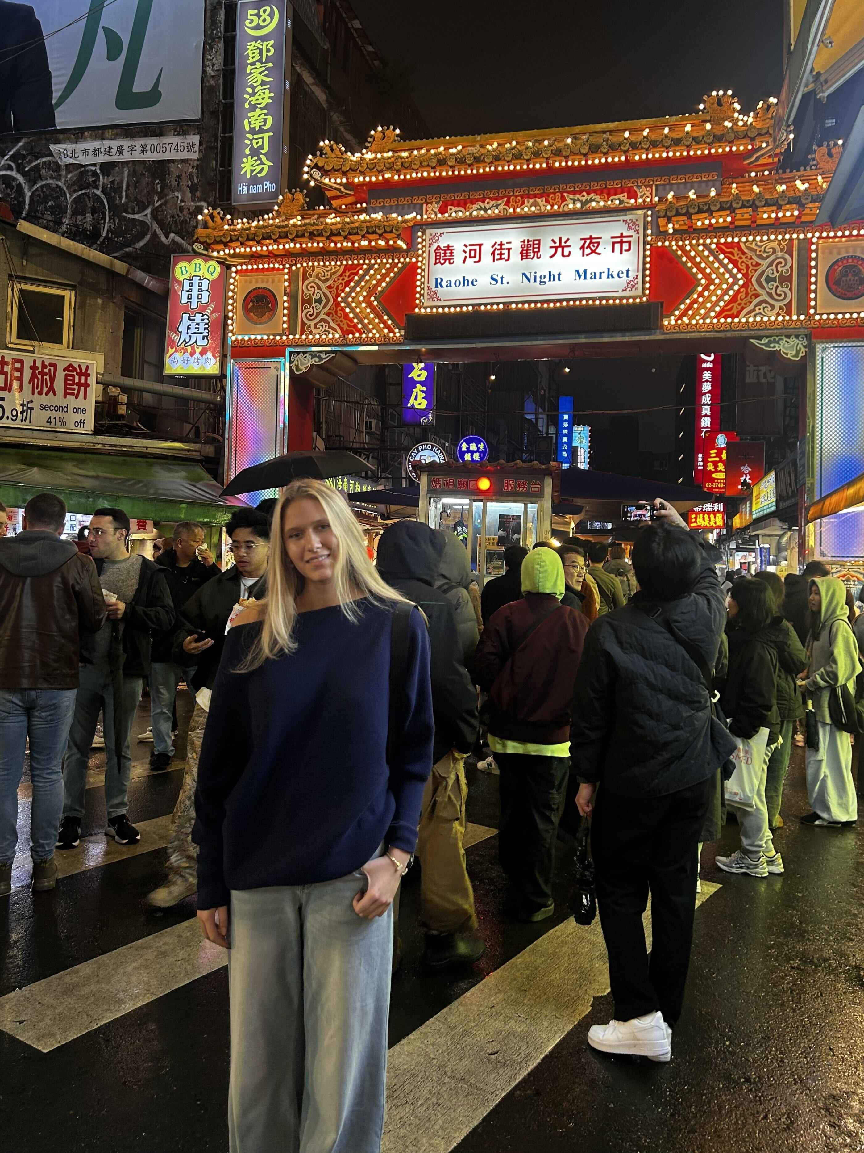 woman standing infront of a walk way