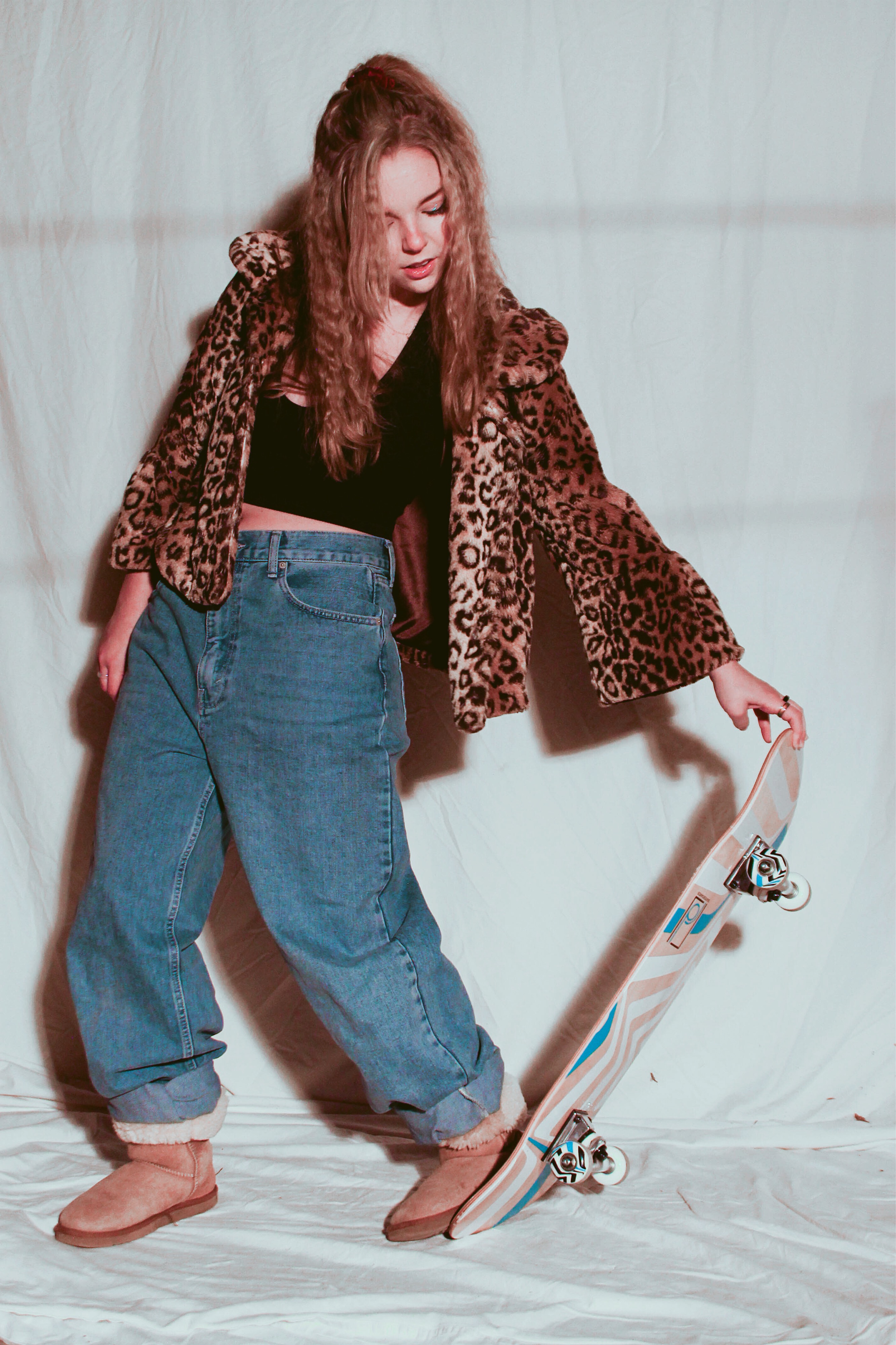 Woman from the 2000s in front of white backdrop