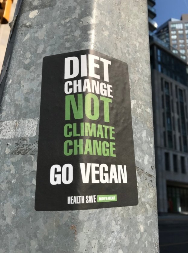Diet Change not climate change go vegan sign by Levi Hearne?width=698&height=466&fit=crop&auto=webp&dpr=4