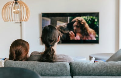 two women watching tv