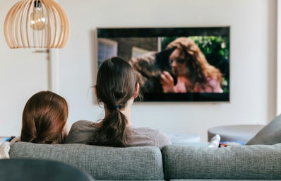 two women watching tv