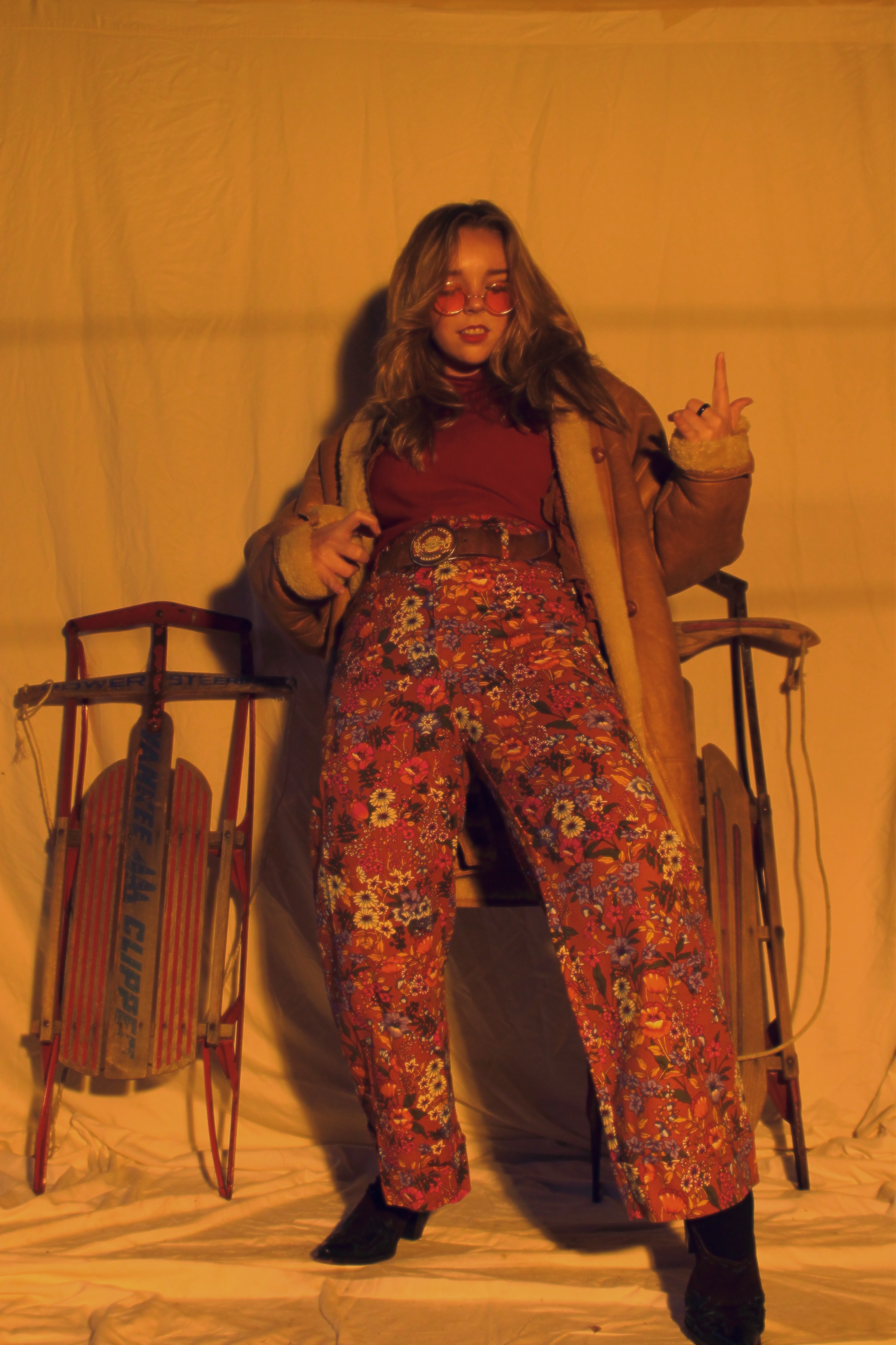 Woman from the 1970s in front of white backdrop