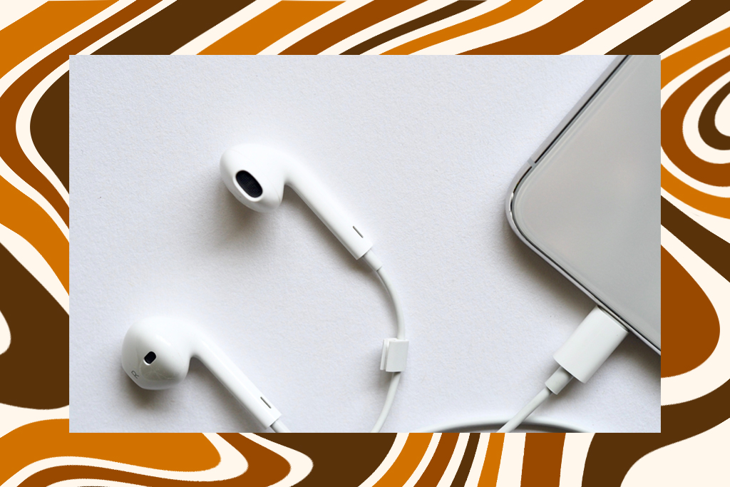 headphones plugged into cell phone