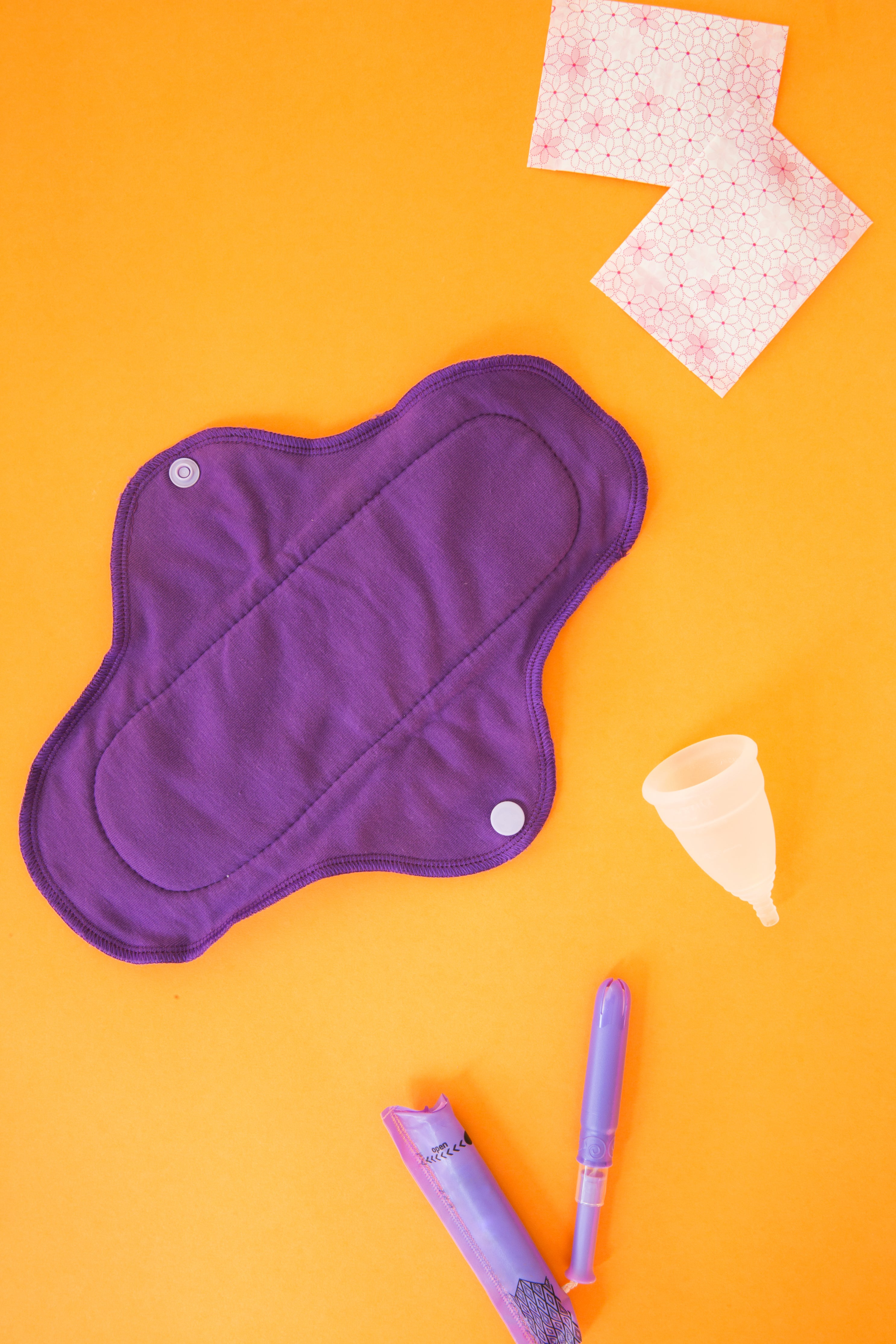 apurplereusablemenstrualpadcupandapplicatorjpg by Sarah Pflug?width=698&height=466&fit=crop&auto=webp&dpr=4