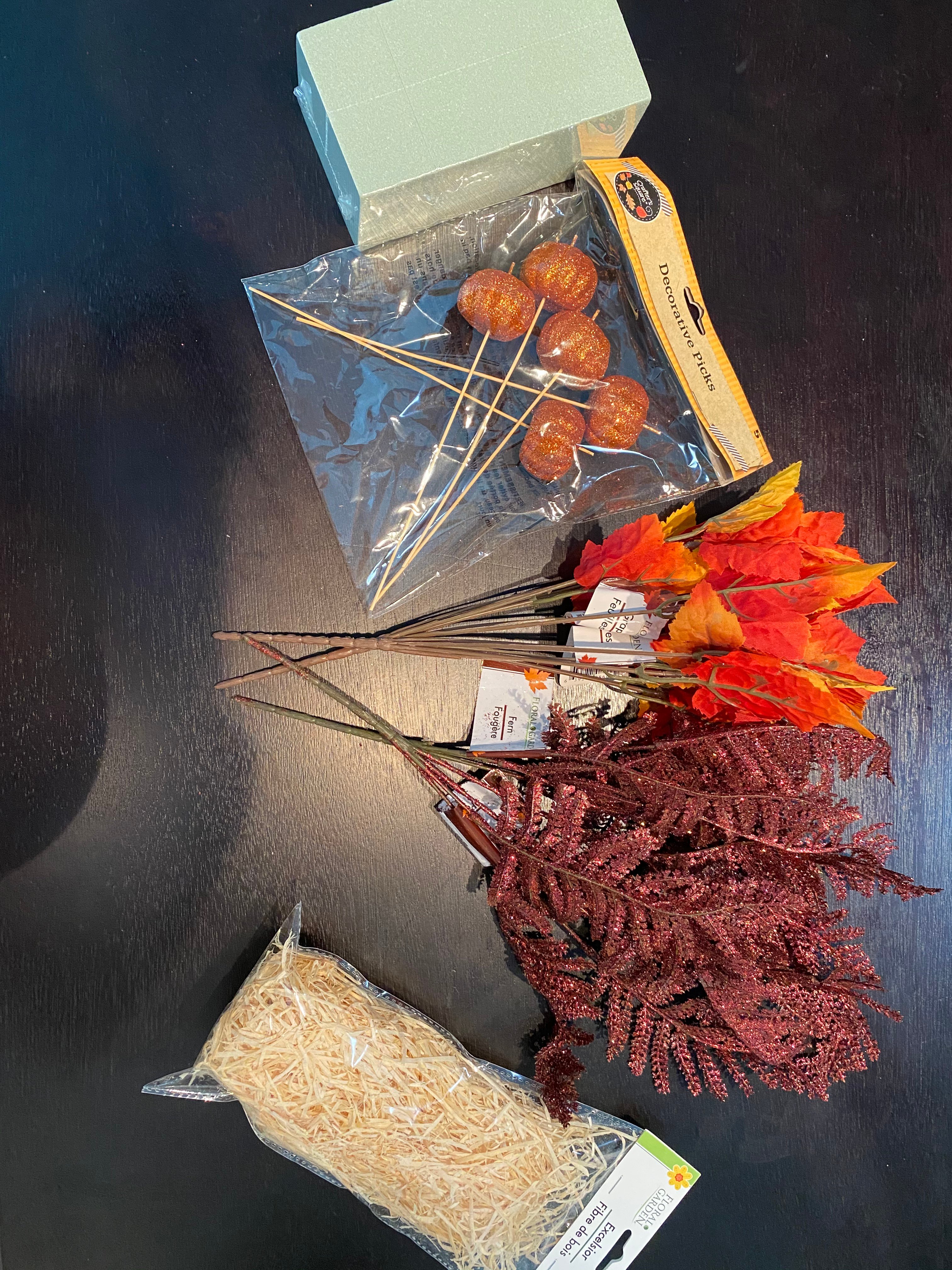 stuff from the dollar tree to create a fall centerpiece