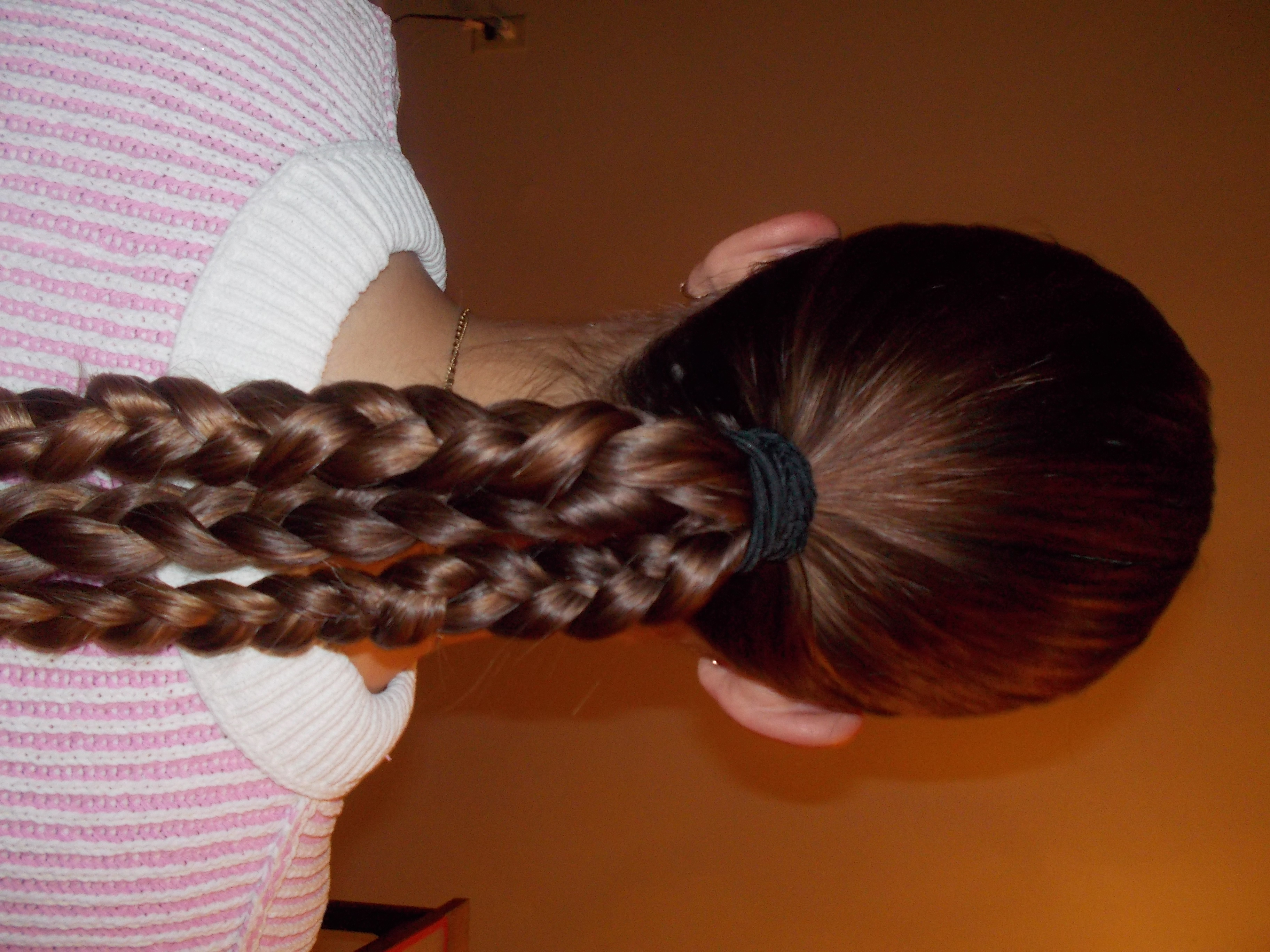 back of womans hair showcasing hairstyle