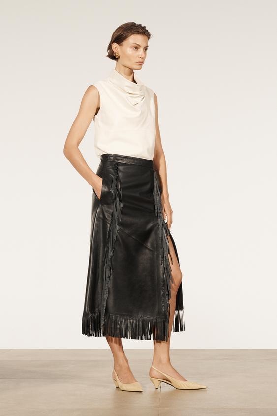 woman in leather skirt