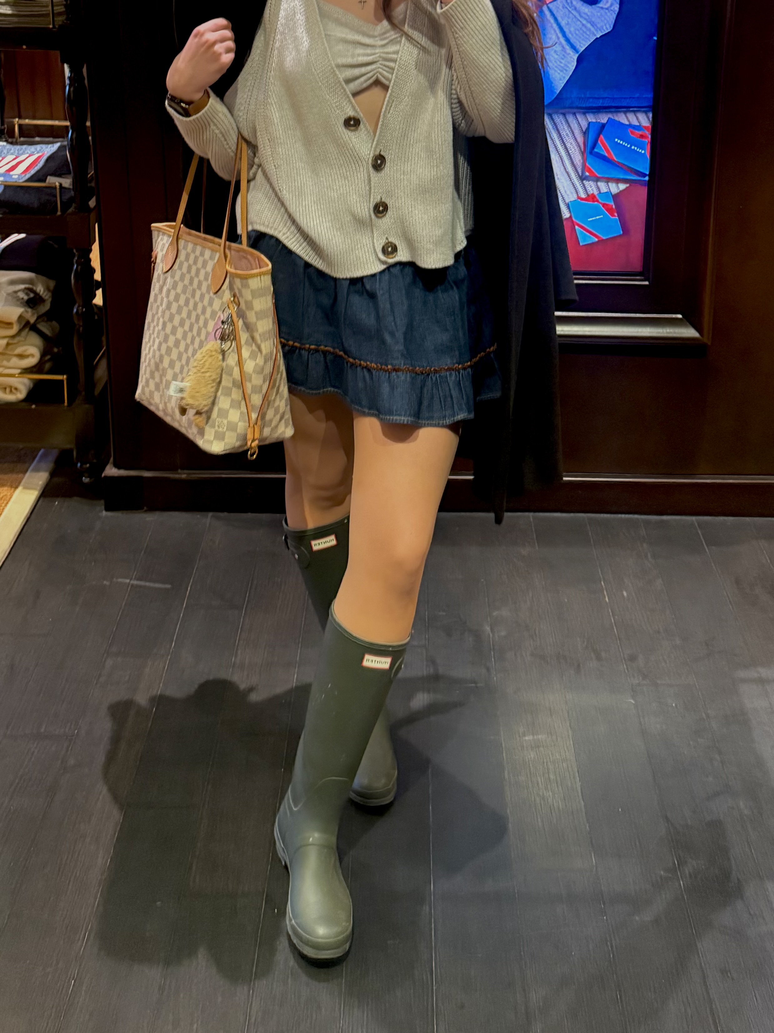 Me taking a mirror selfie with my welly boots