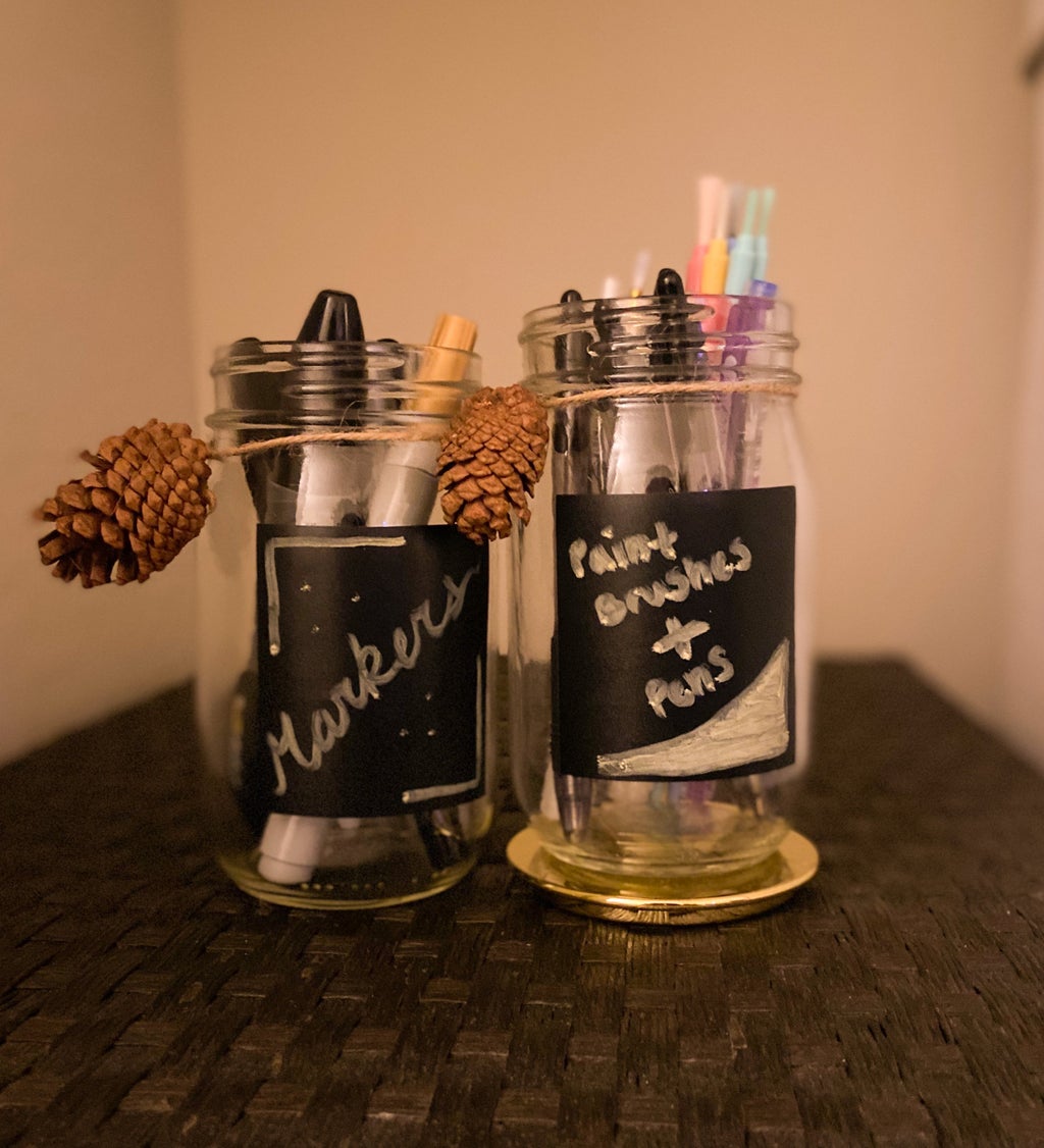 two jars full of pens