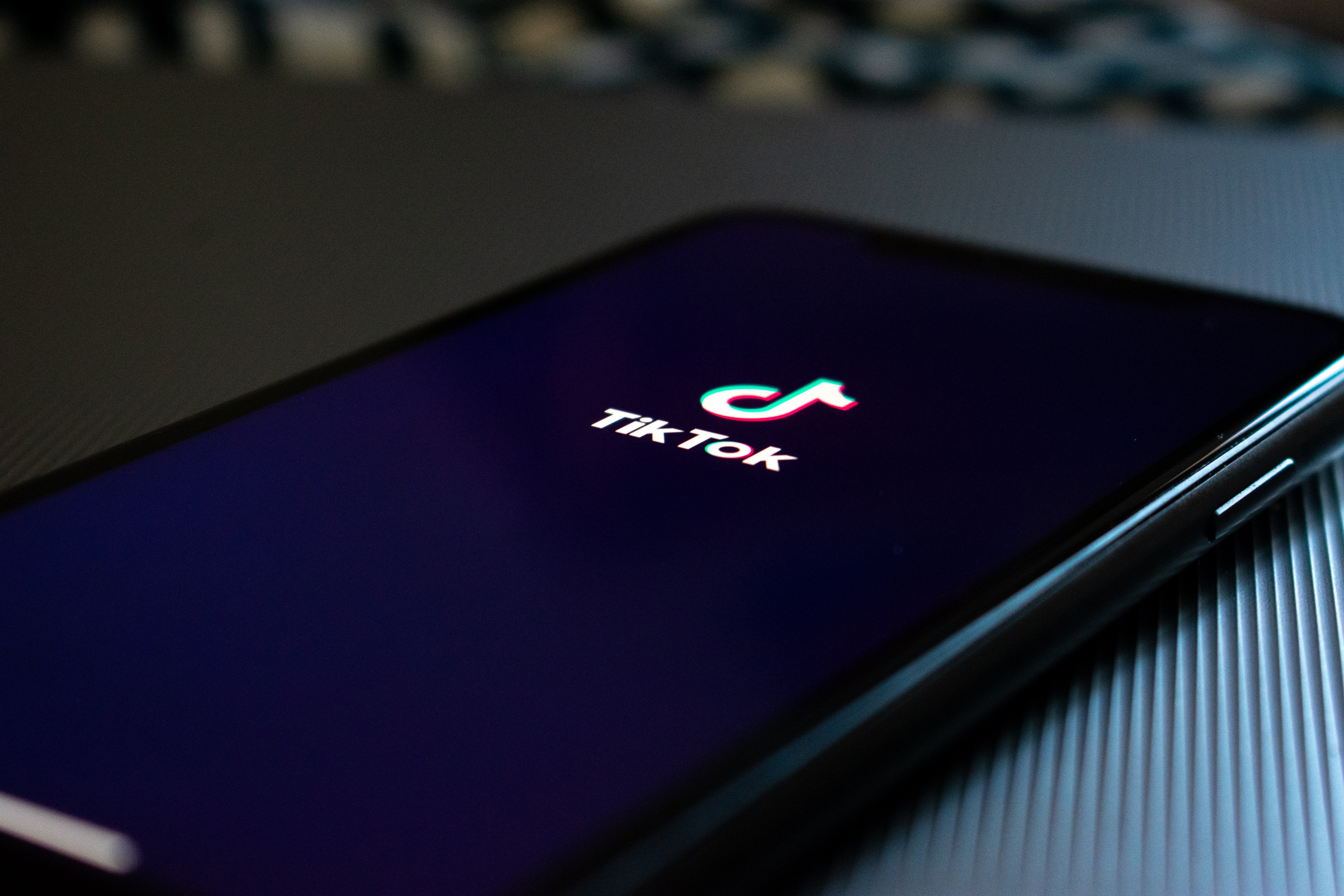 tiktok on iPhone by Kon karampelas on UnSplash?width=698&height=466&fit=crop&auto=webp&dpr=4
