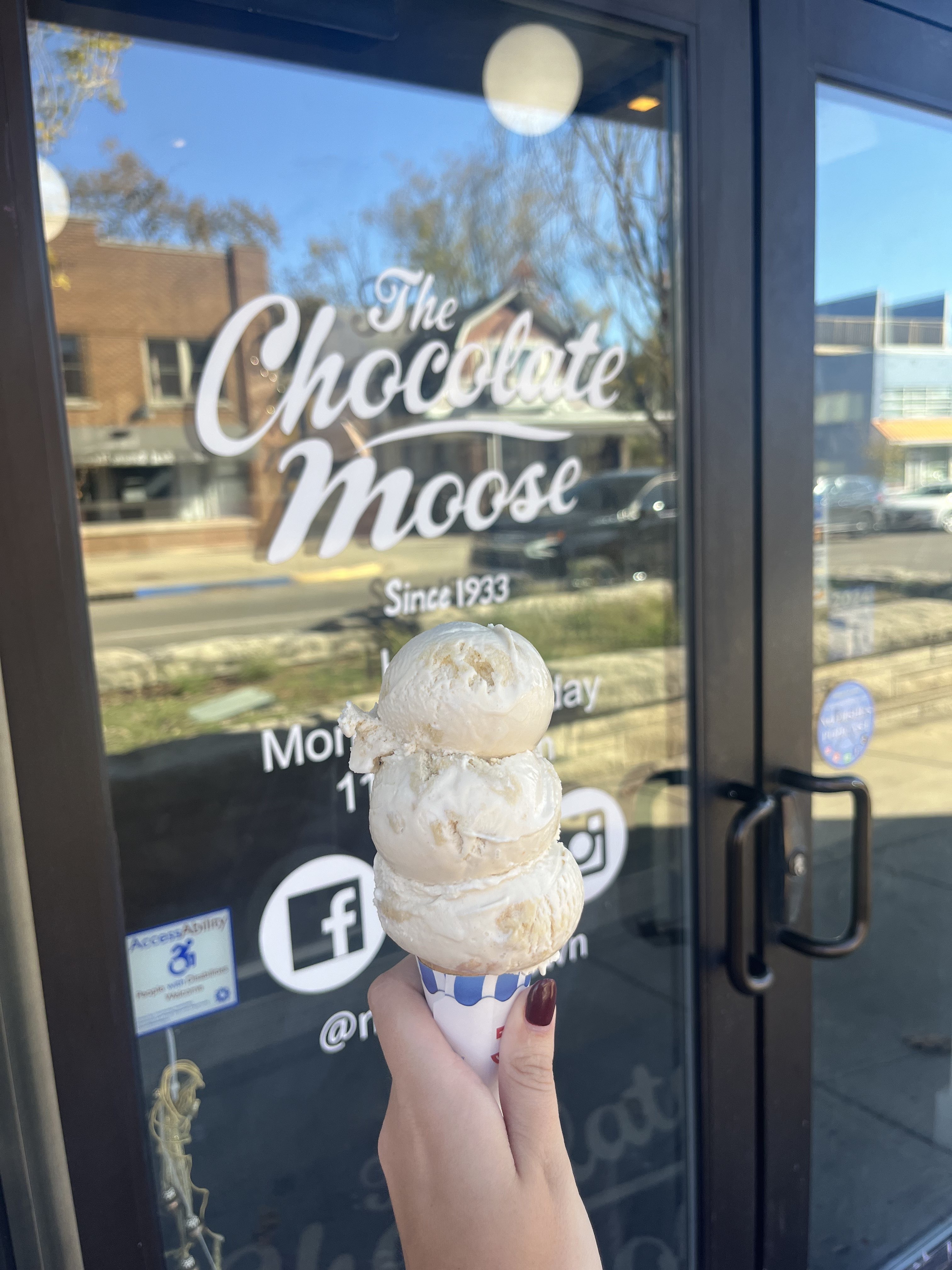 Three scoops of one of Chocolate Moose\'s fall flavors called Maple Chai Cookie