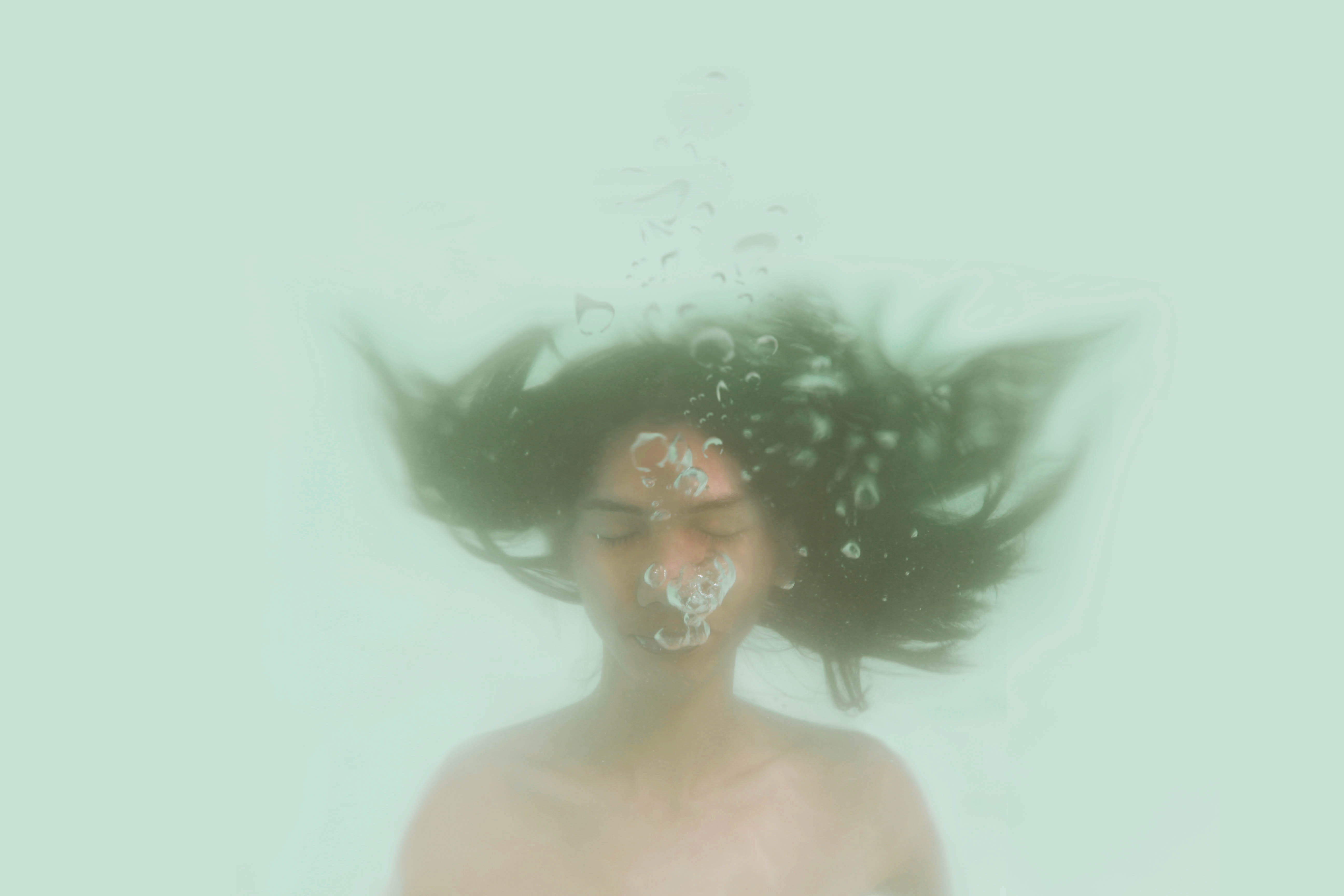 Girl underwater blows out air bubbles by Nate Neelson?width=698&height=466&fit=crop&auto=webp&dpr=4