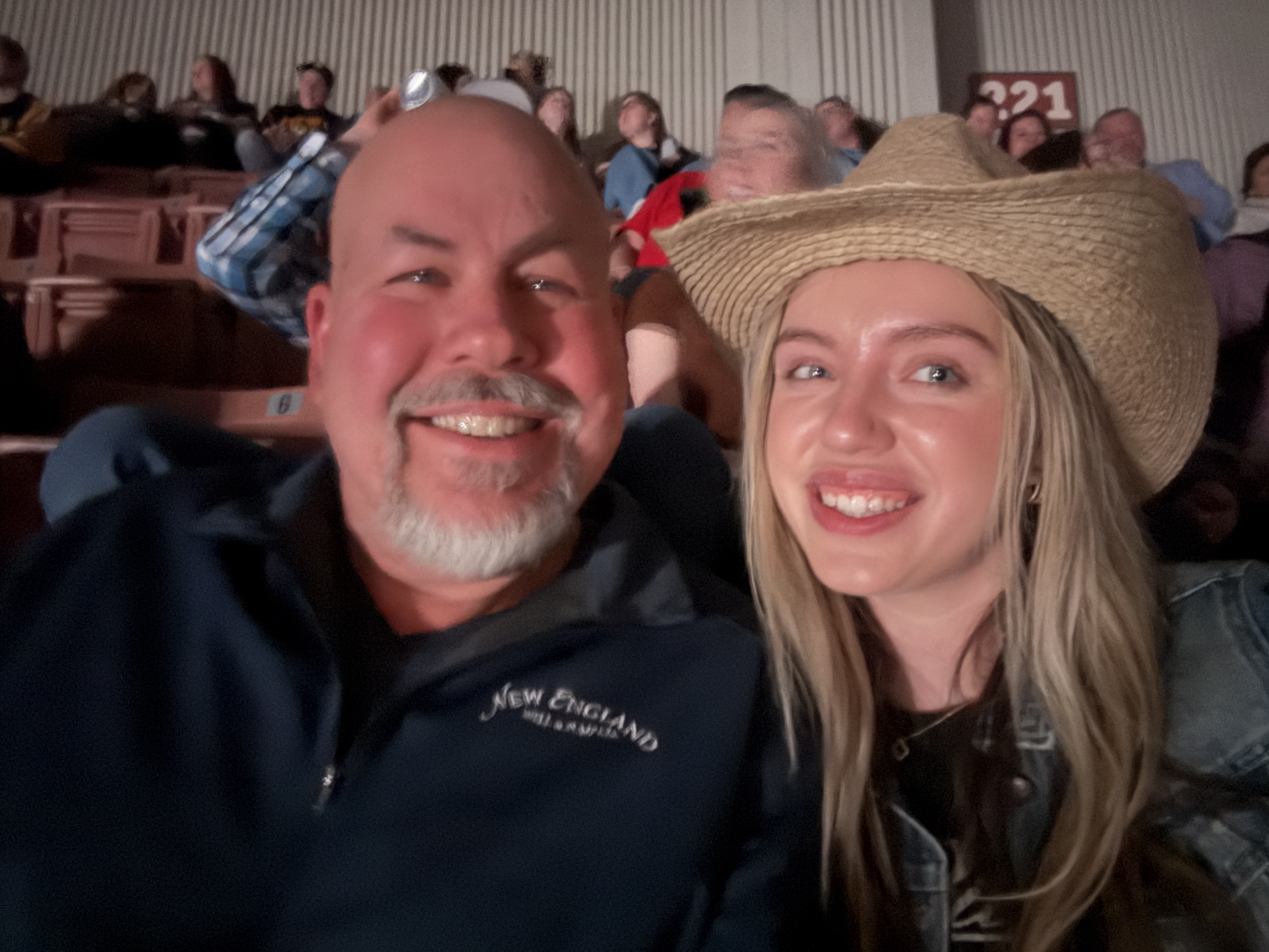 Father and daughter at a Rascal Flatts concert