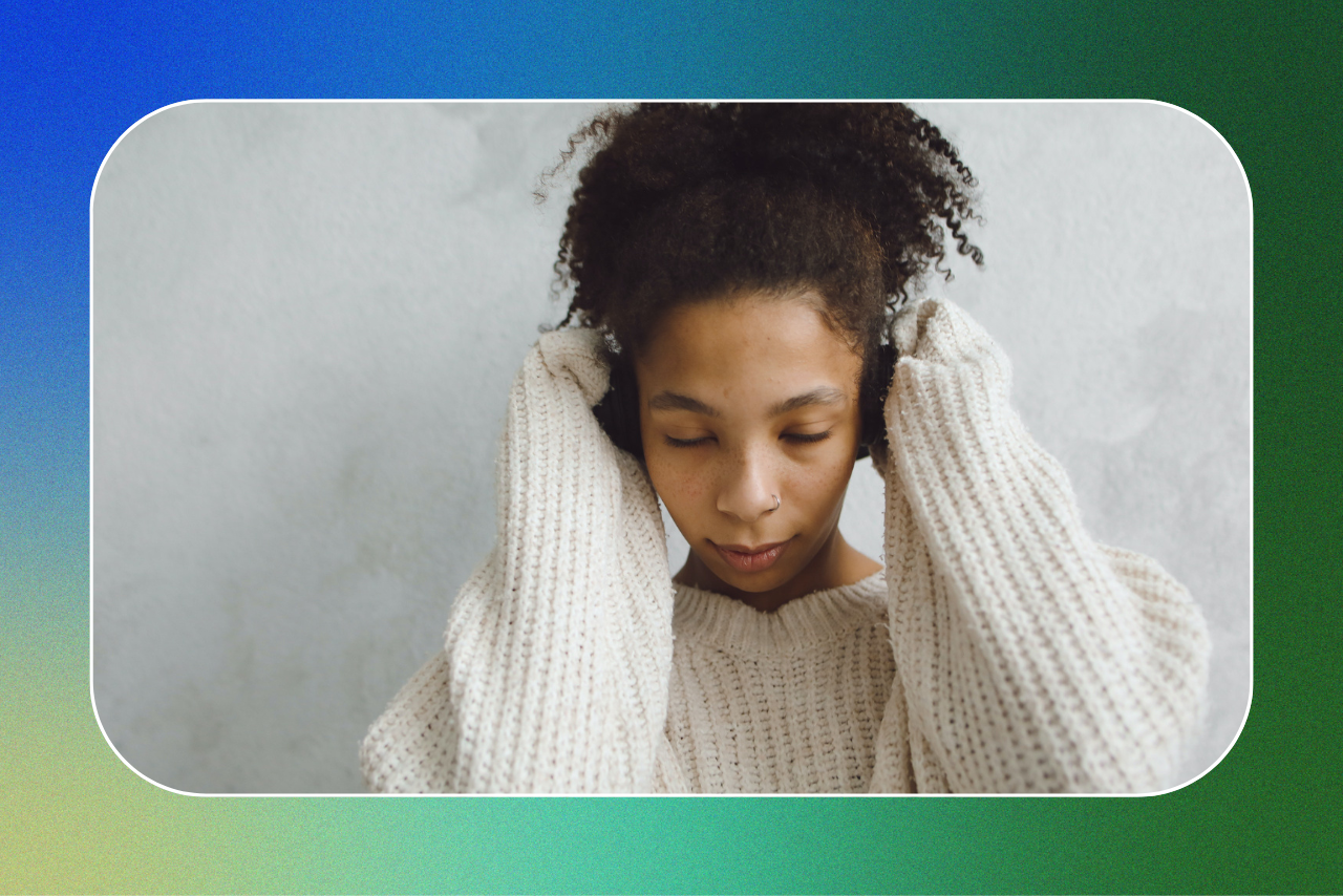 woman listening to a podcast on headphones