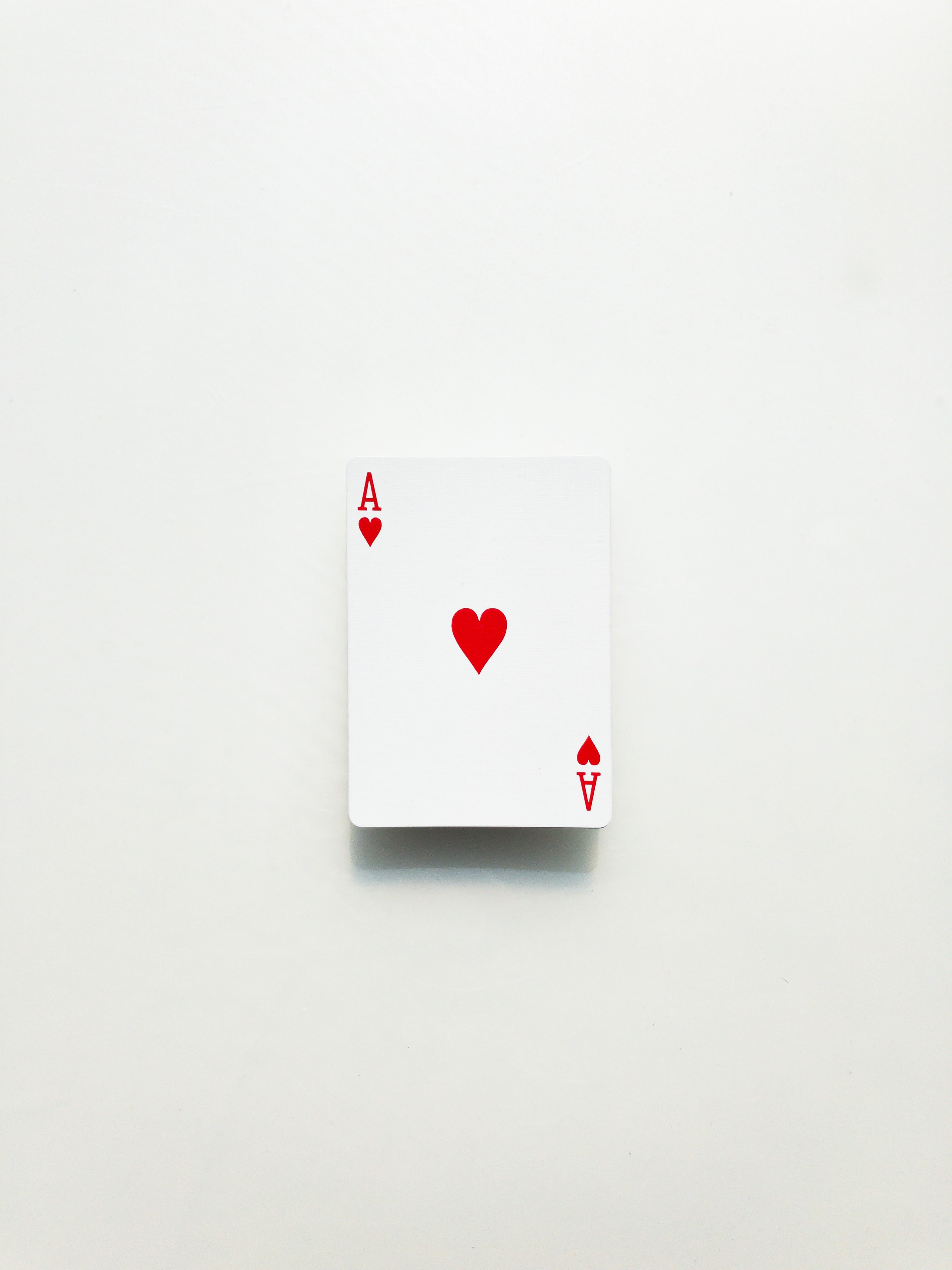 ace of hearts card on a white background