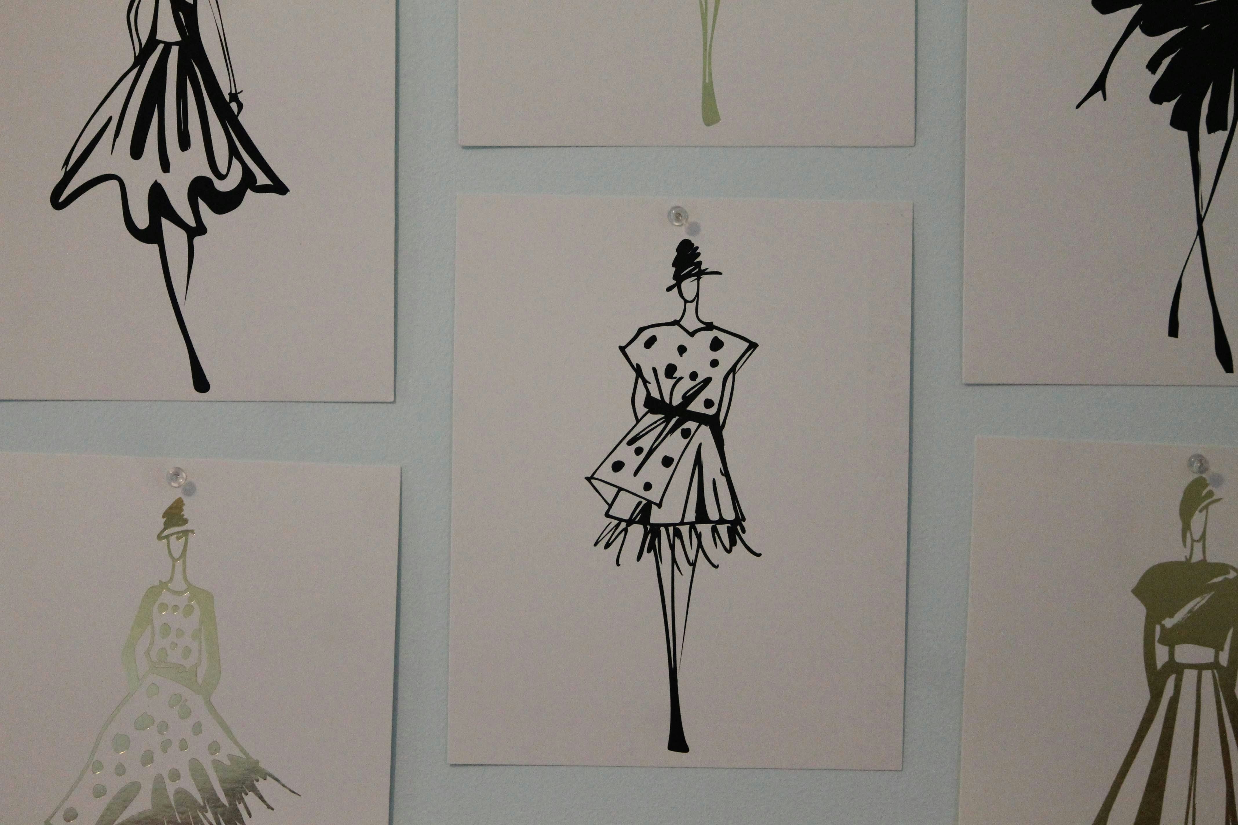 picture of fashion sketches on wall