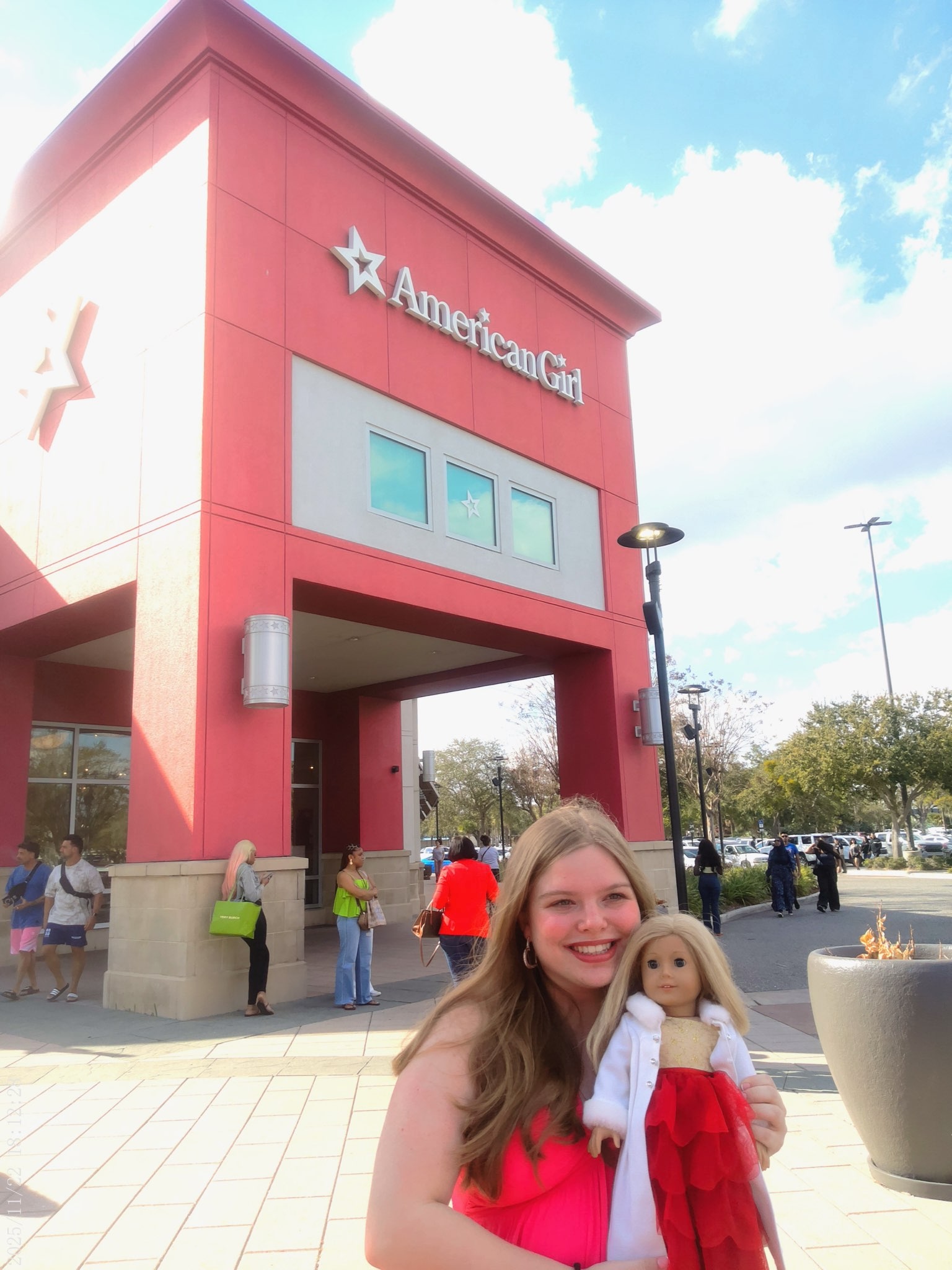 Me with my look-a-like American Girl in front of the American Girl Store in Orlando.
