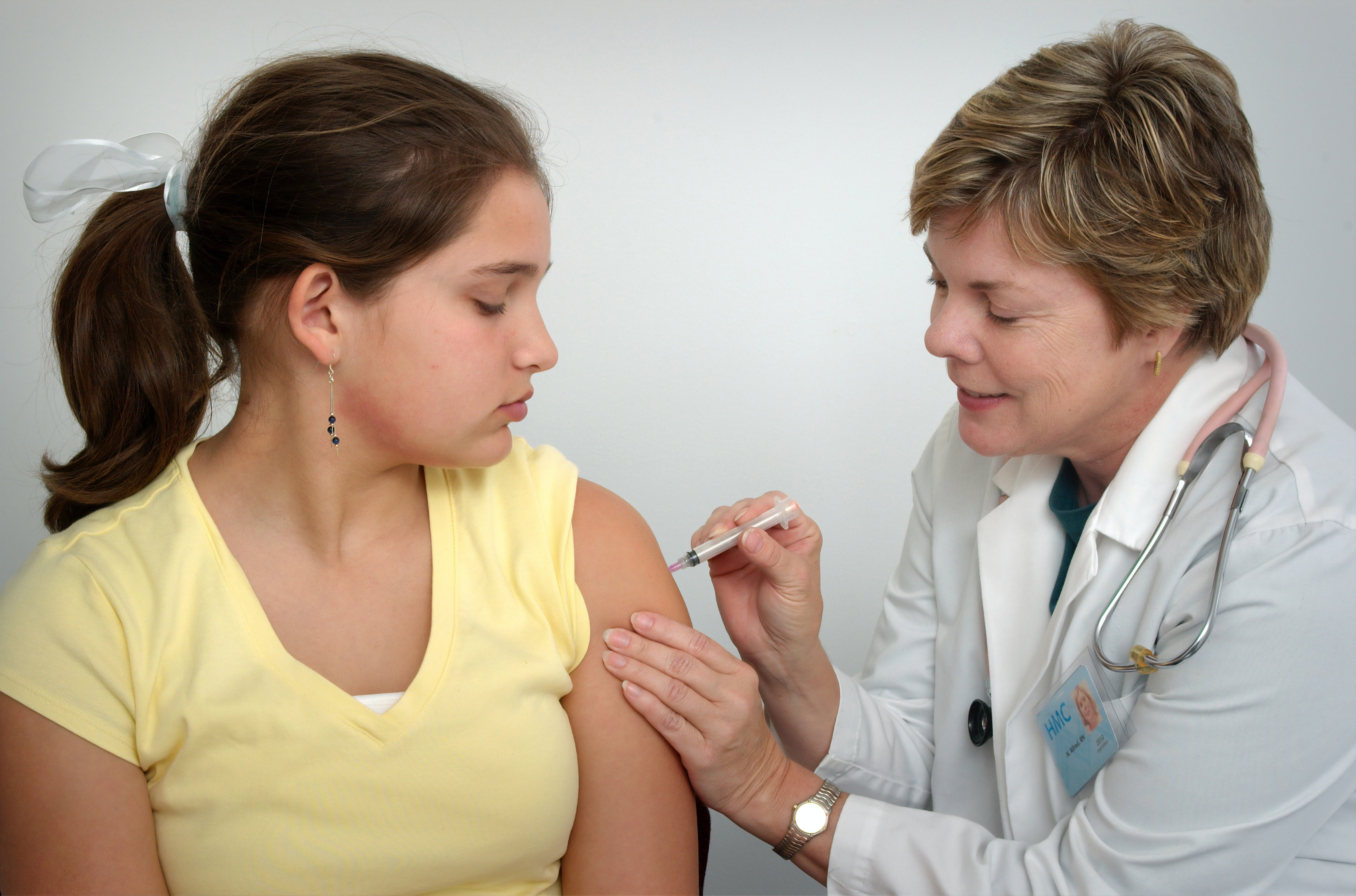 doctor giving girl vaccination by Unsplash?width=698&height=466&fit=crop&auto=webp&dpr=4