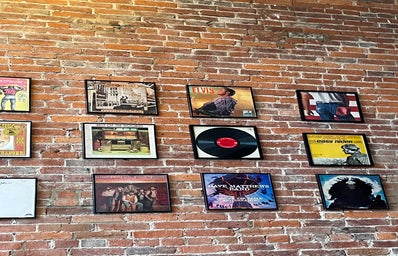 Records on the wall of a coffee shop