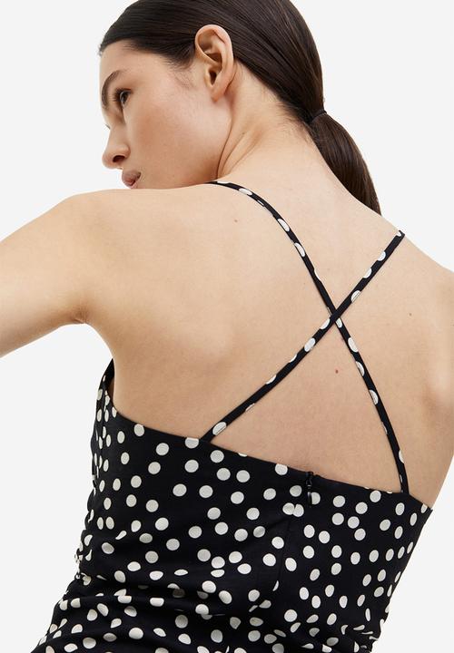 woman in polka dot dress