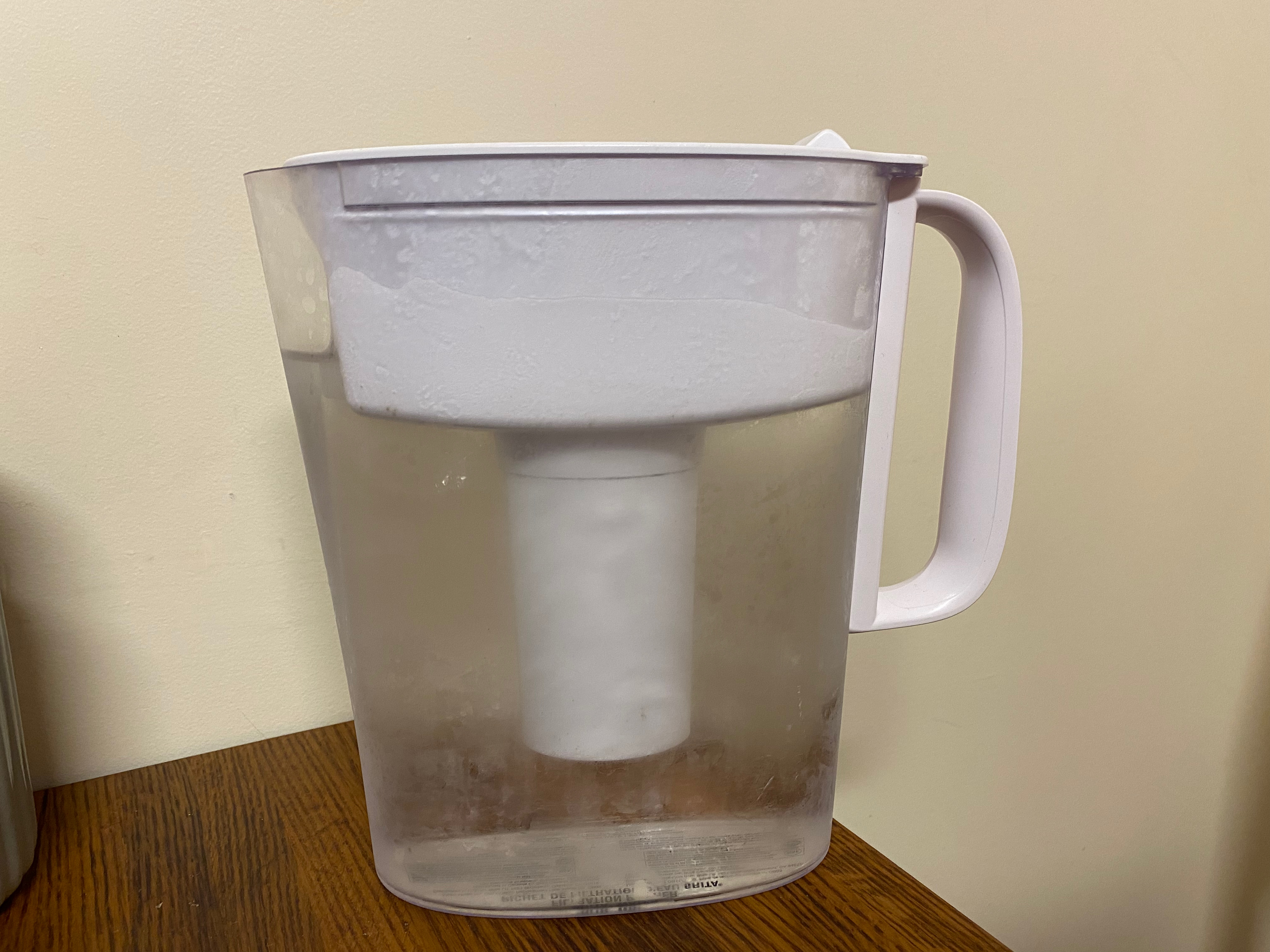 A Brita Filter against a blank wall