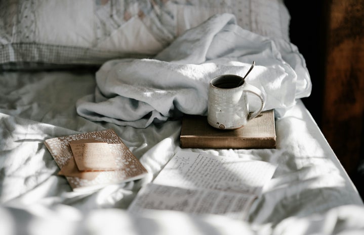 Bed withe coffee and journal.