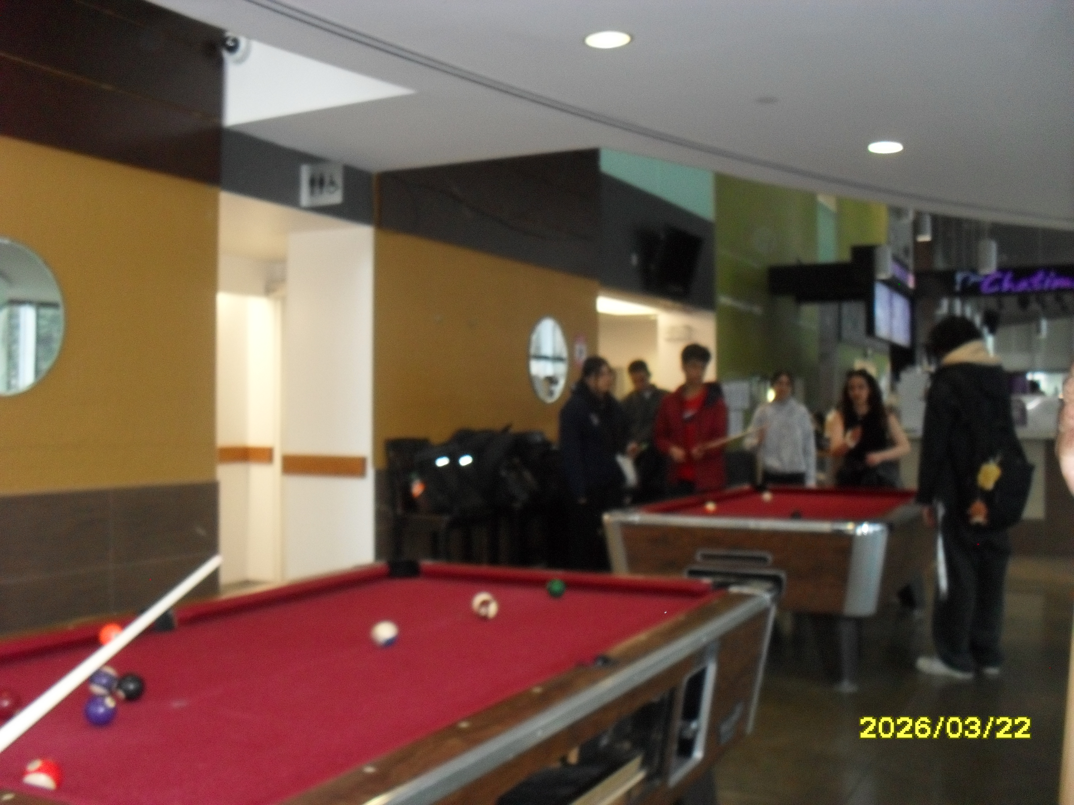 People playing pool