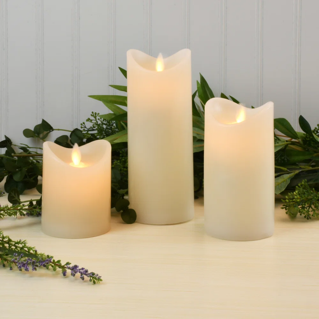 set of three white column candles with faux flame